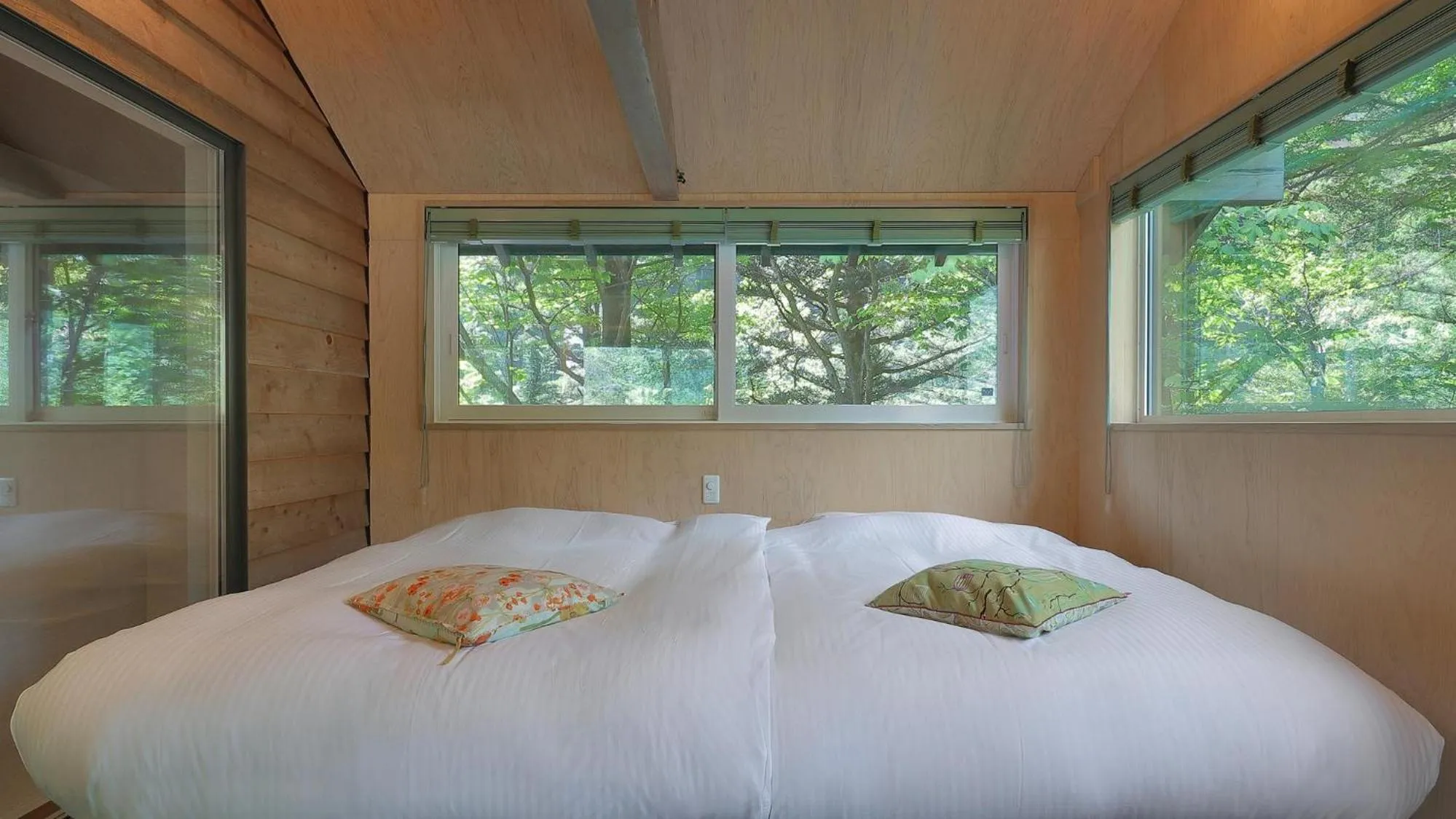 Bed in Onsen Glamping ShimaBlue