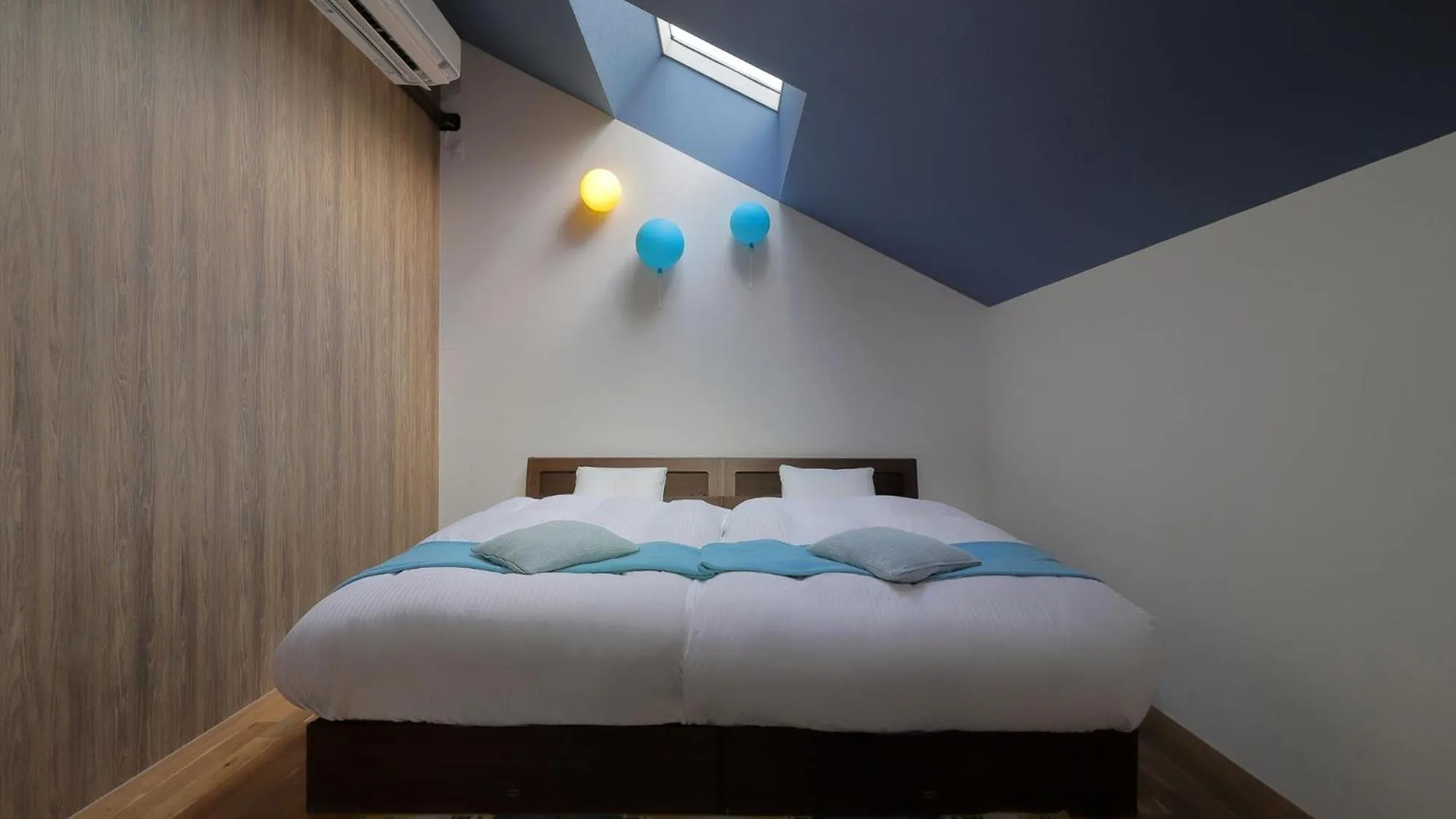 Bed in Onsen Glamping ShimaBlue