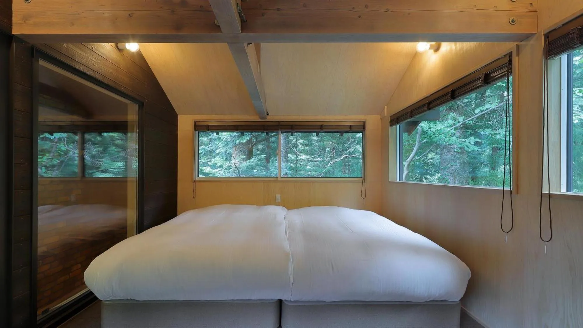 Bed in Onsen Glamping ShimaBlue