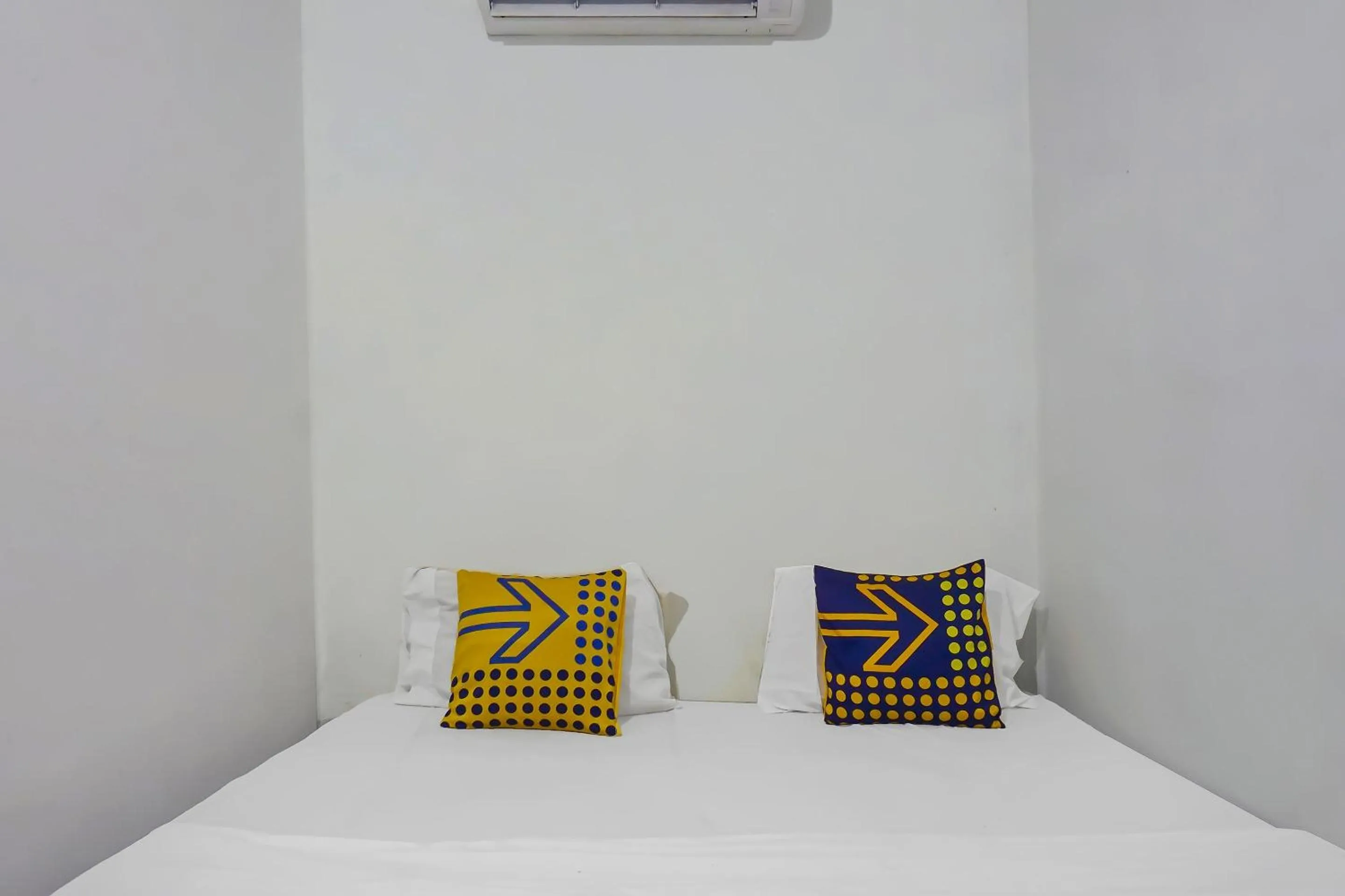 Bedroom in Hotel O Nusasari Guest House