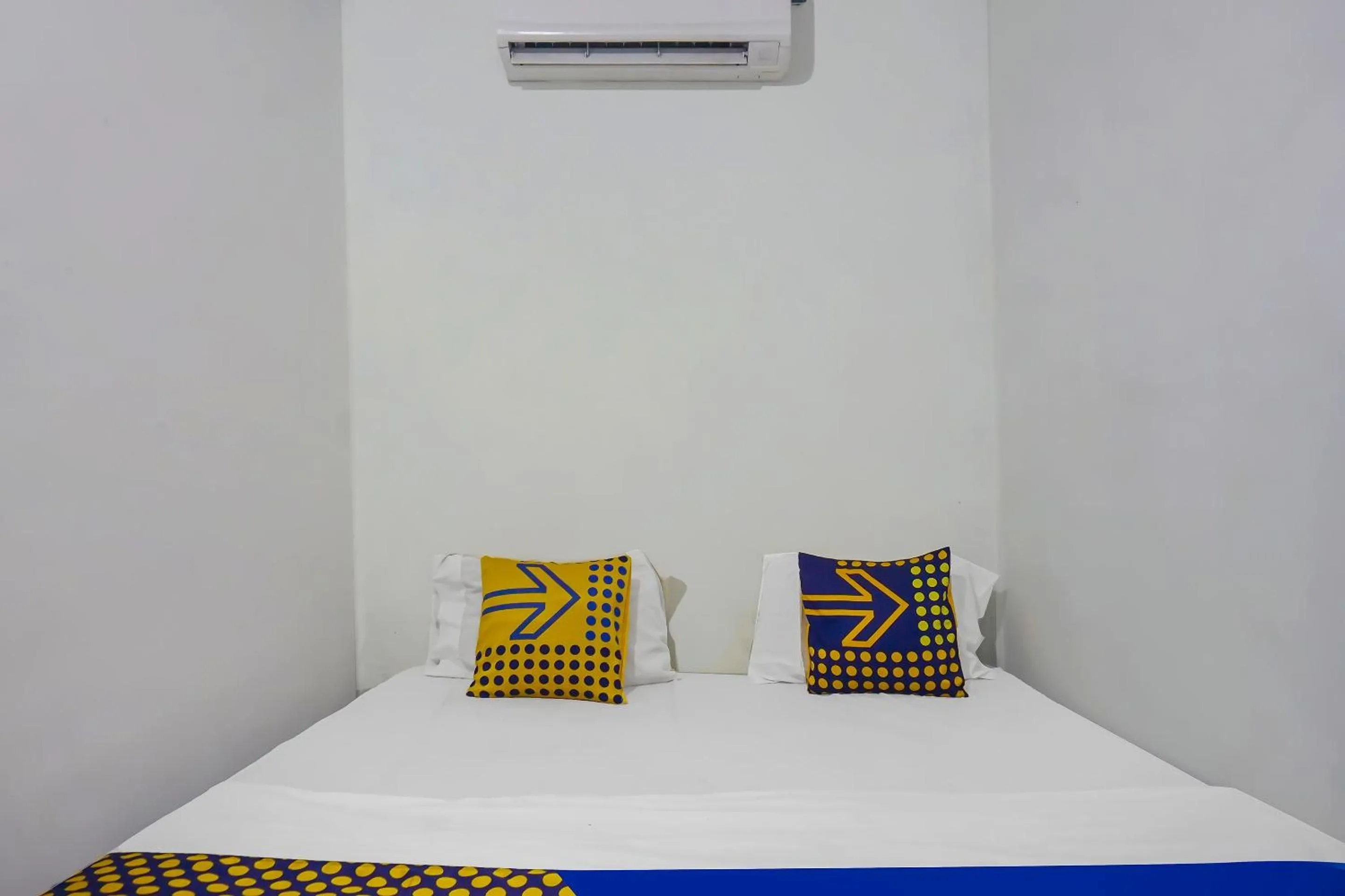 Bedroom in Hotel O Nusasari Guest House