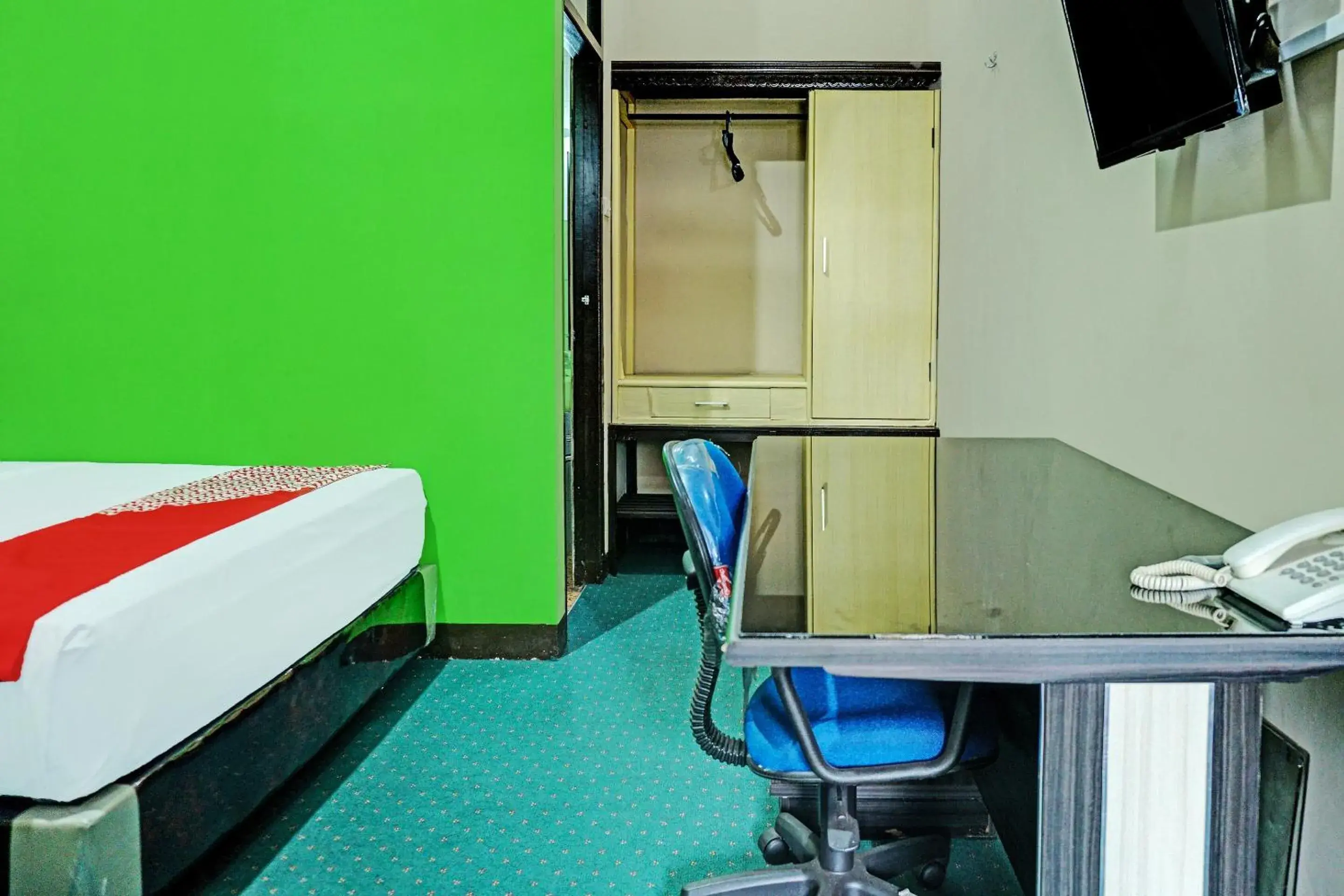 Bedroom in Hotel O Wisma Inayah Syariah Bedroom in Hotel O Wisma Inayah Syariah