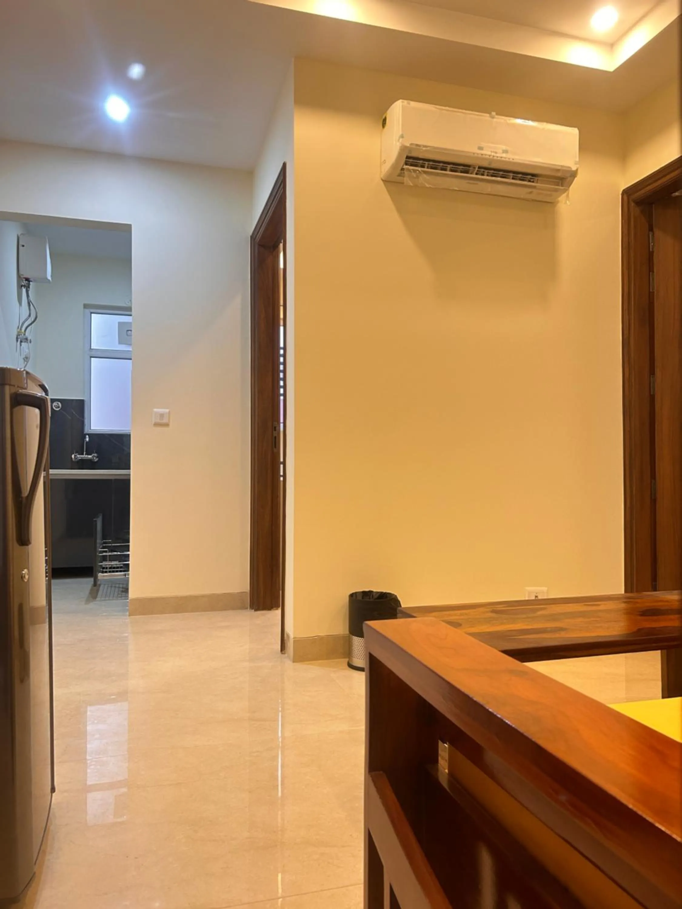 Kitchen or kitchenette in Lime Tree 1BHK Serviced Apartment - Medanta Medicity, Gurgaon