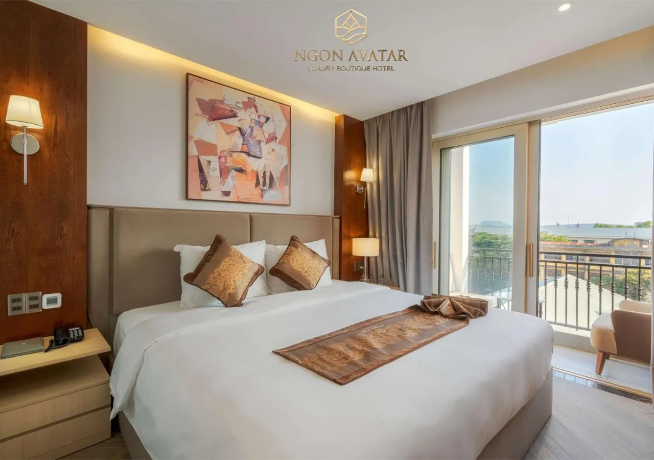 Bed in Ngon Avatar Hotel