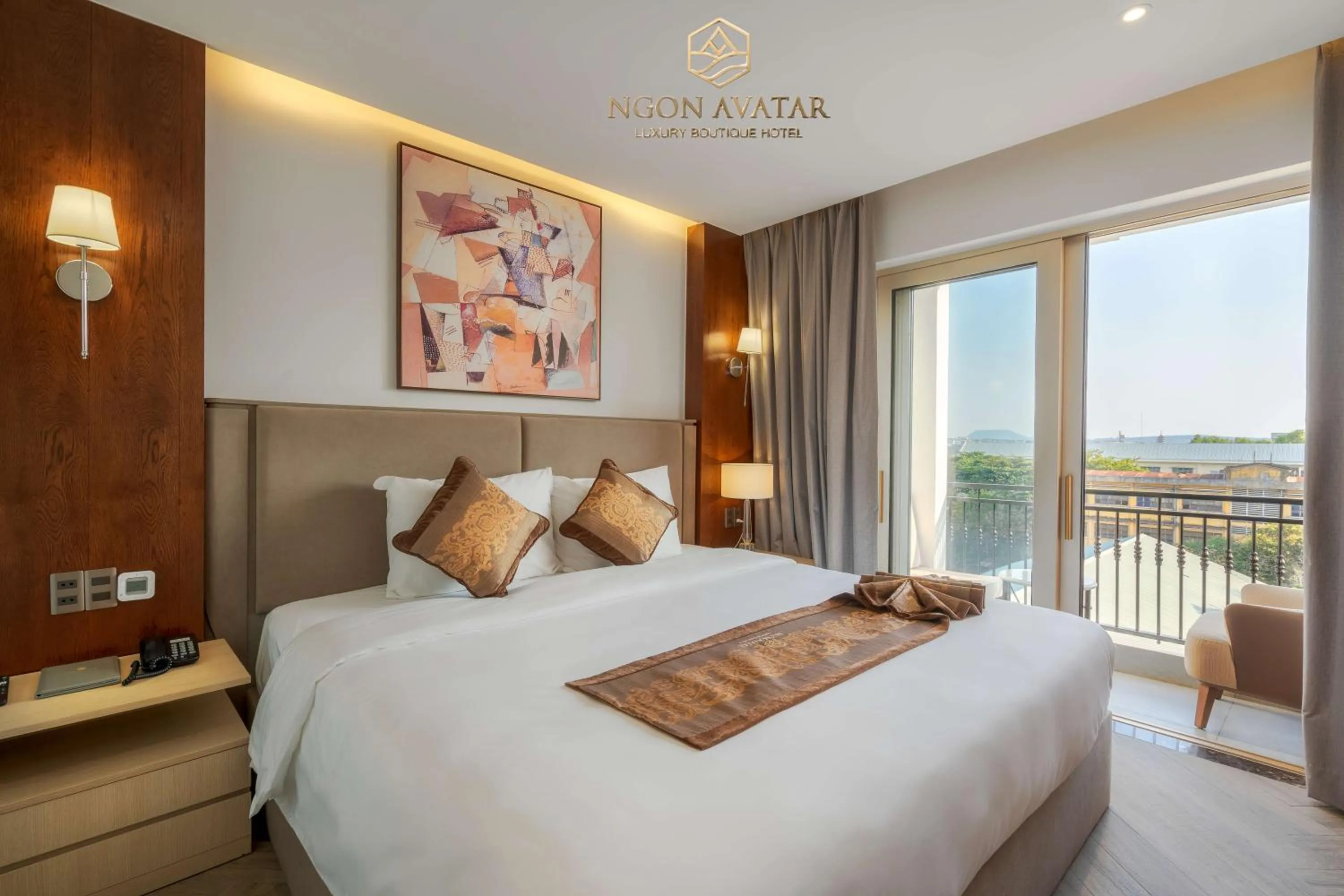 Bed in Ngon Avatar Hotel