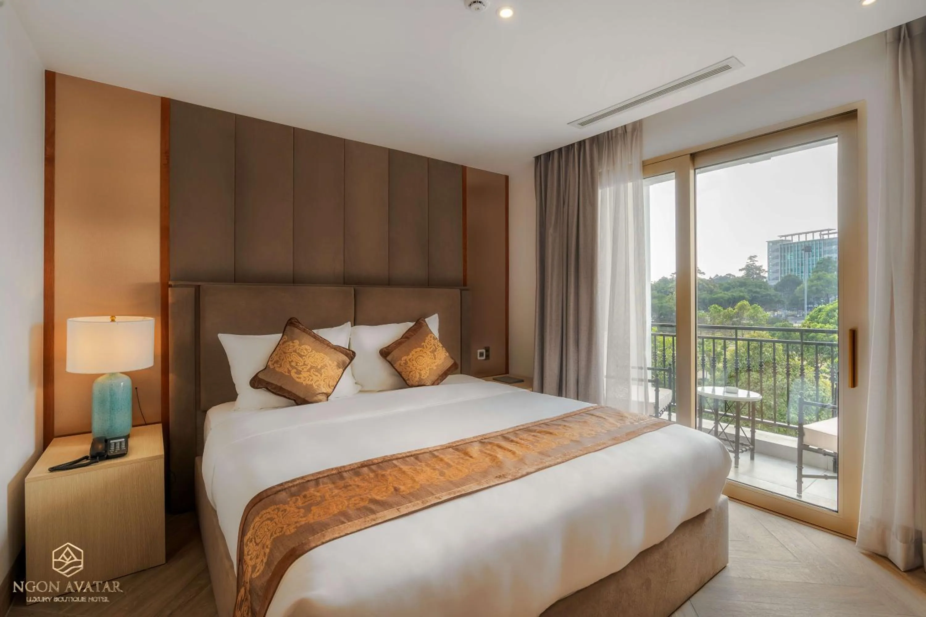 Bed in Ngon Avatar Hotel