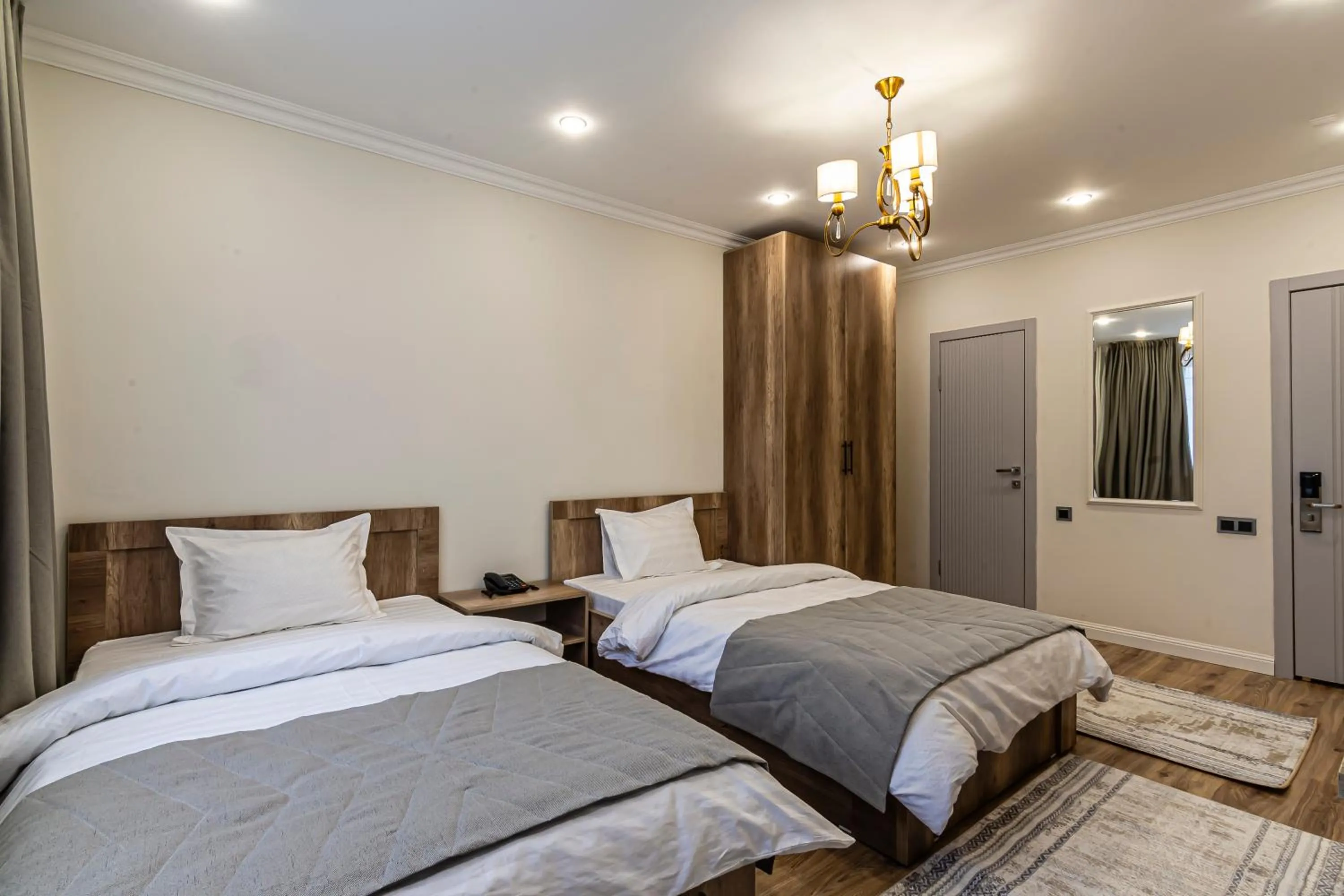 Bed in Oscar Hotel by AG Hotels Group
