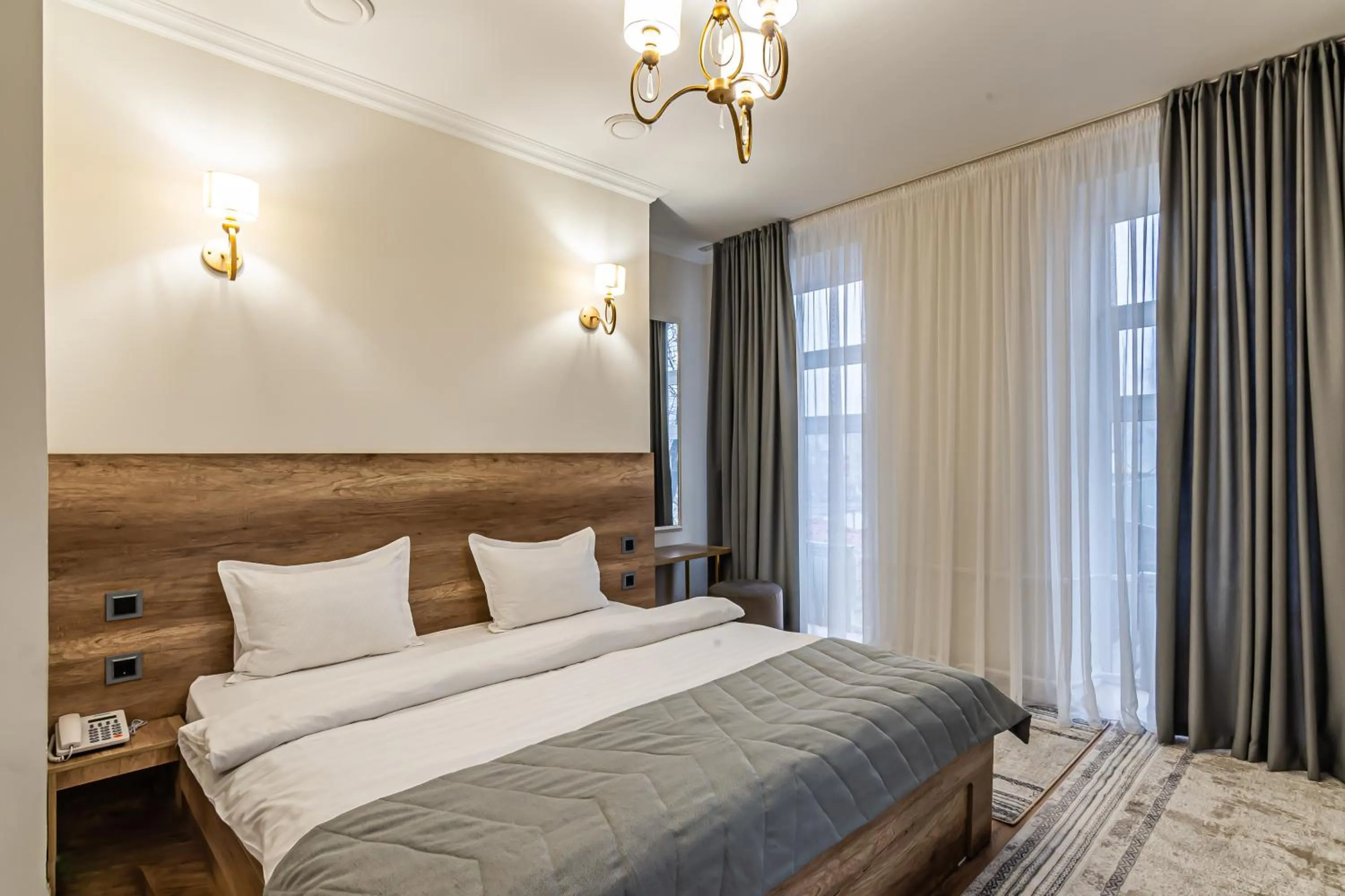 Bed in Oscar Hotel by AG Hotels Group