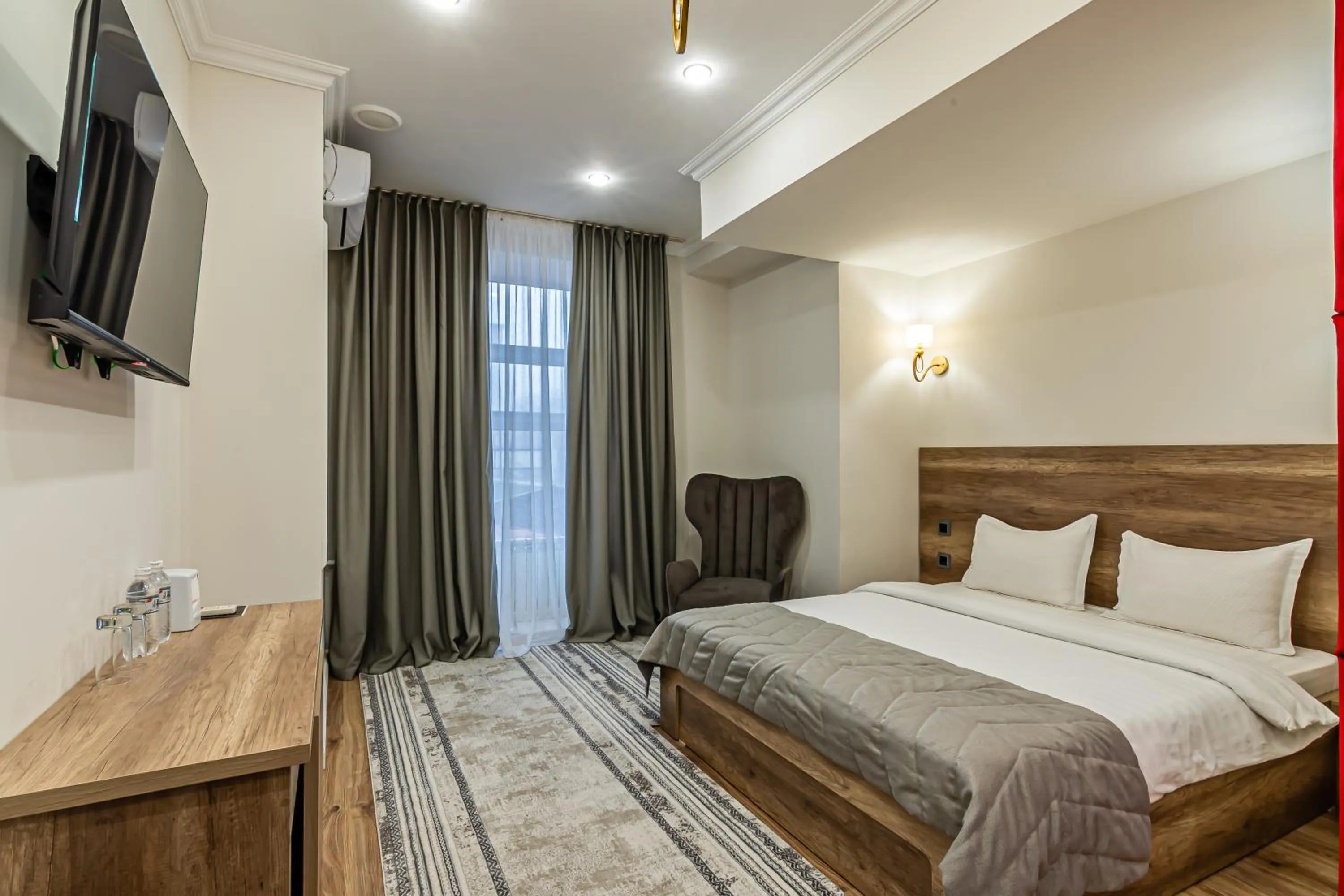 Bed in Oscar Hotel by AG Hotels Group