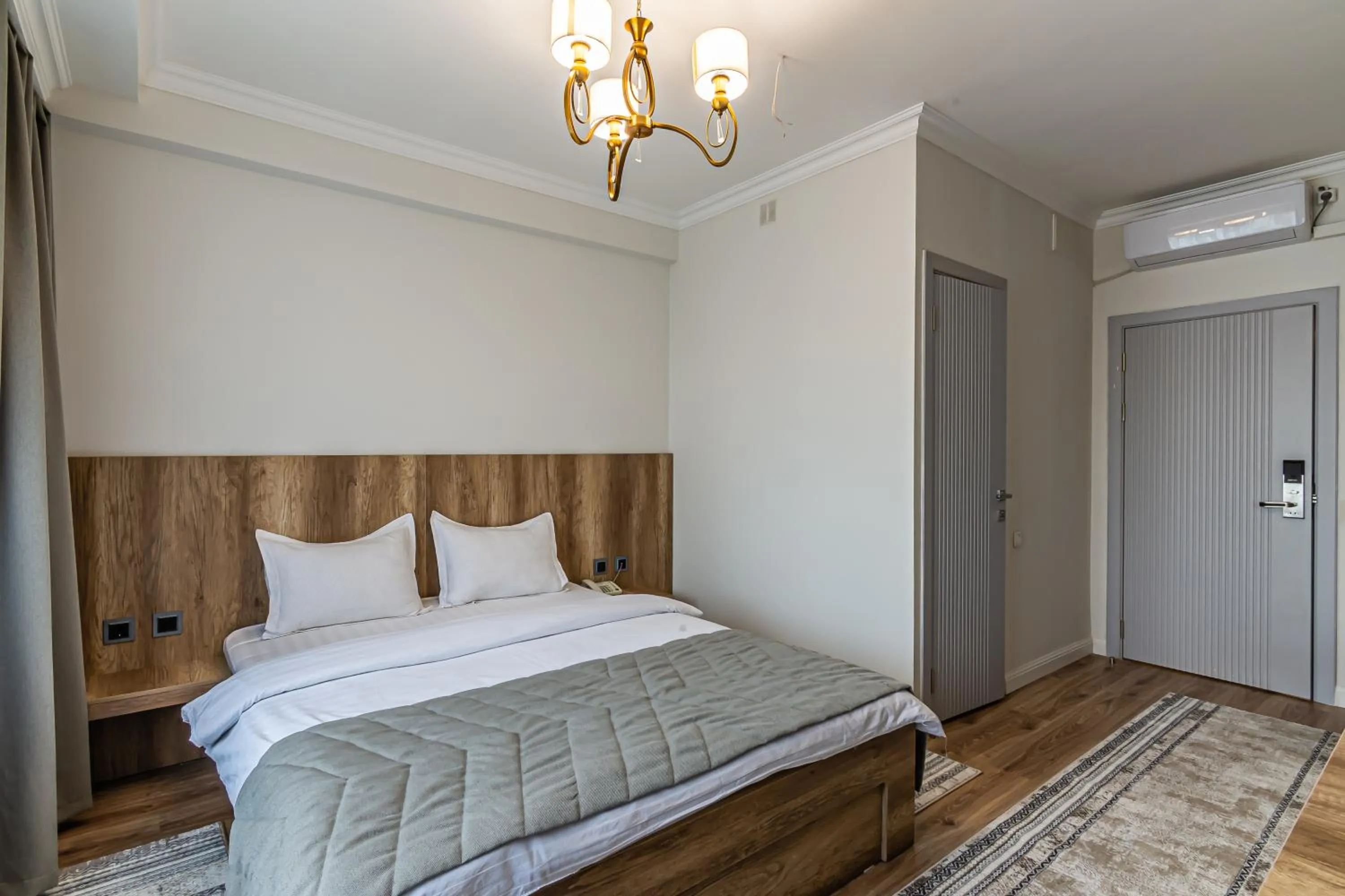 Bed in Oscar Hotel by AG Hotels Group