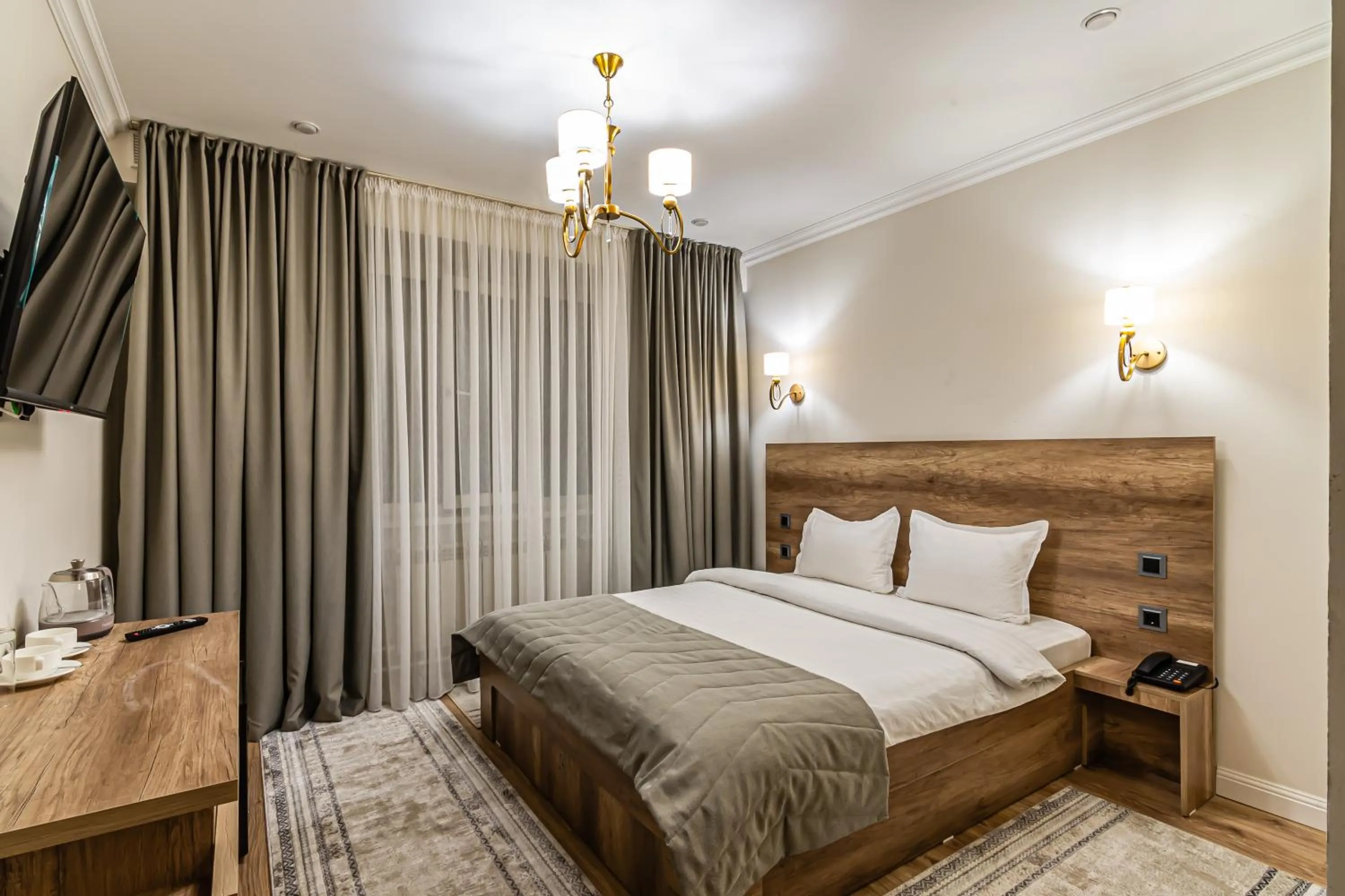 Bed in Oscar Hotel by AG Hotels Group