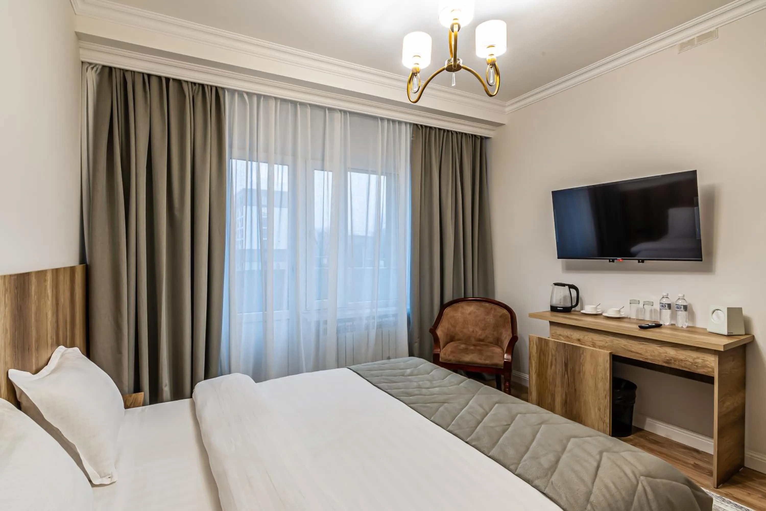 Bed in Oscar Hotel by AG Hotels Group