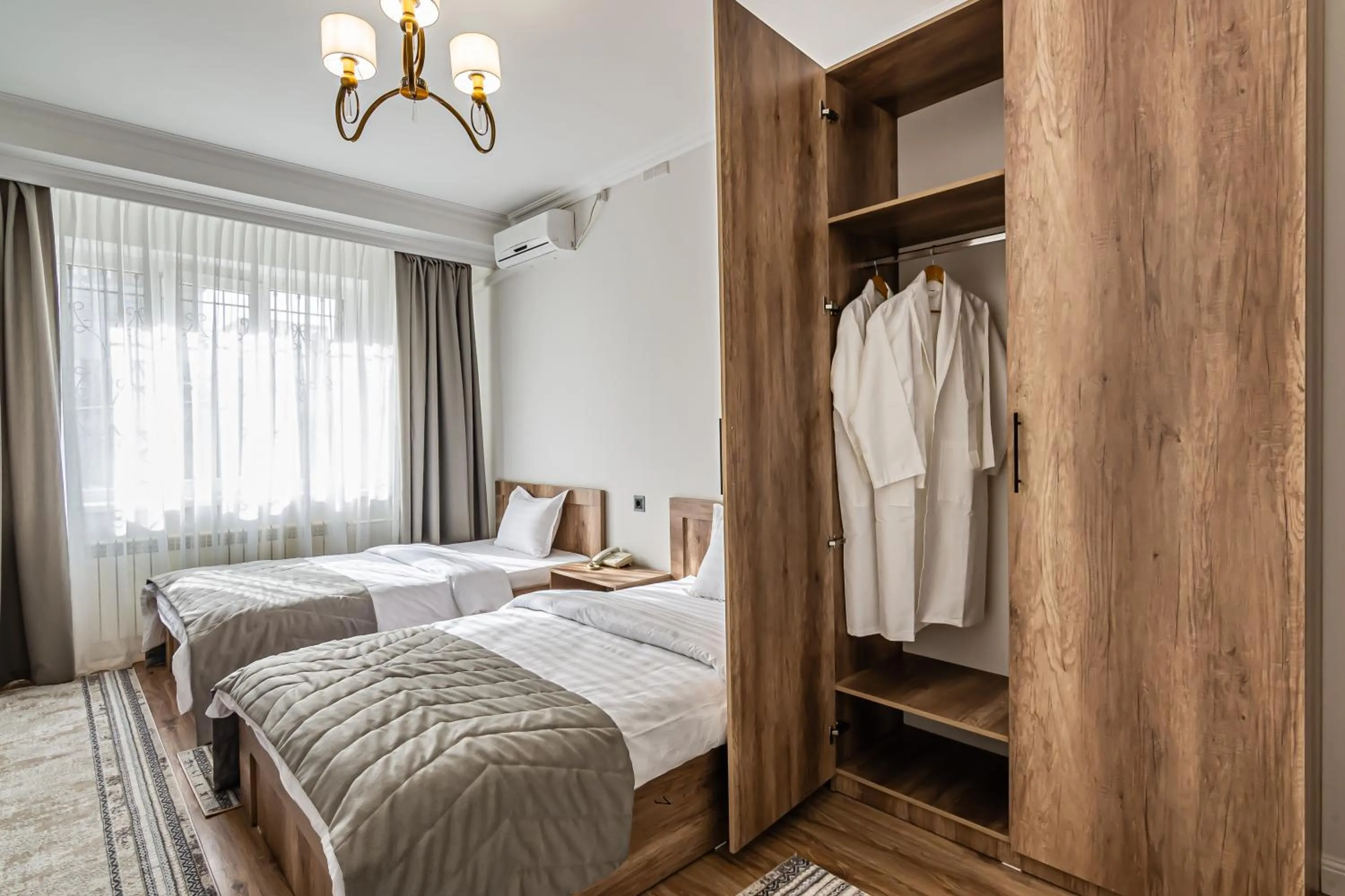 Bed in Oscar Hotel by AG Hotels Group