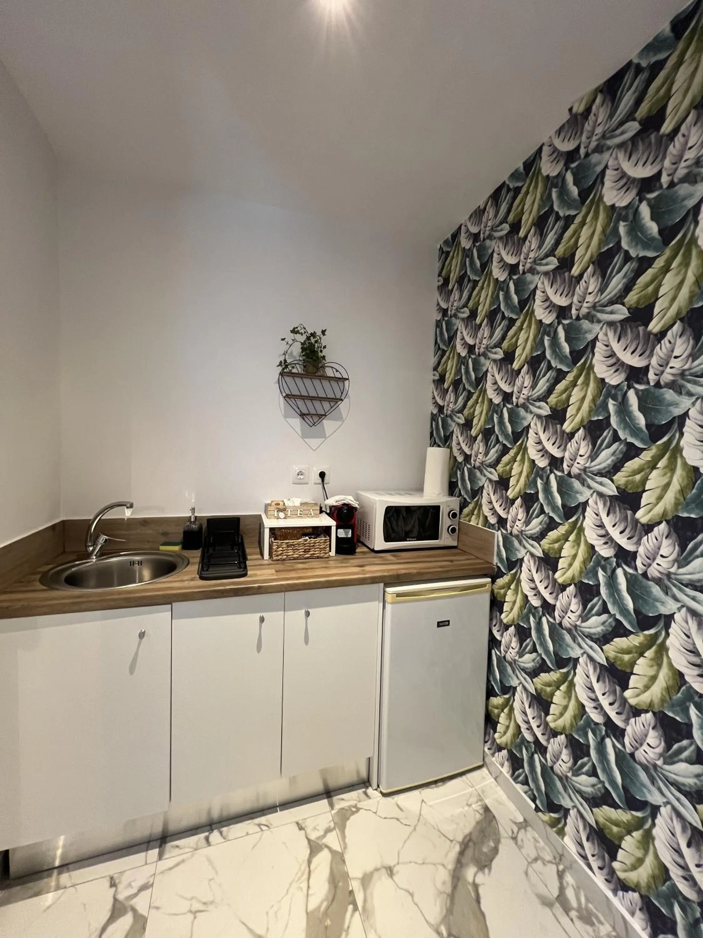 kitchen in Elefsinian Mysteries Apartments