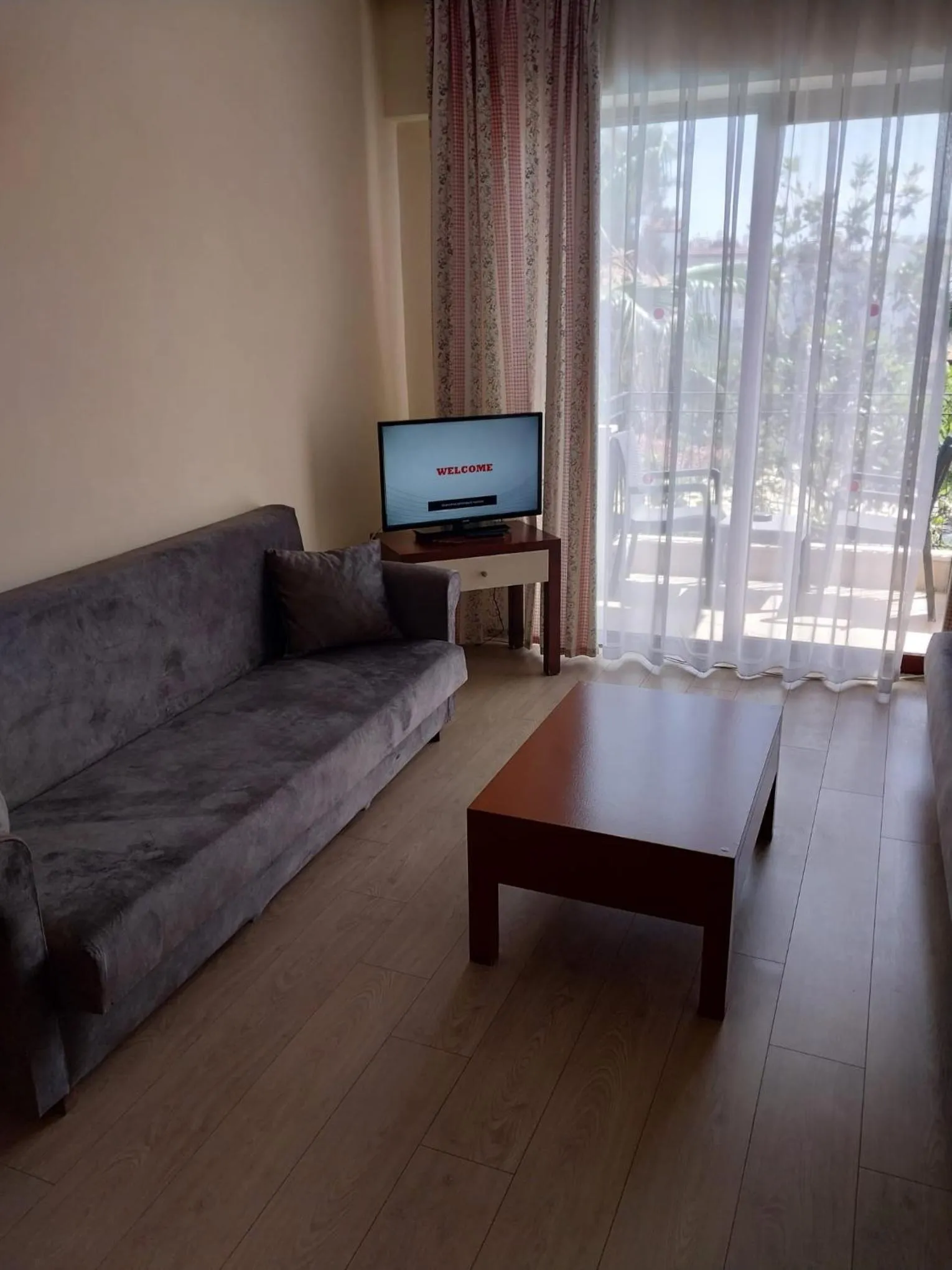 TV and multimedia in LEMAS SUITE HOTEL