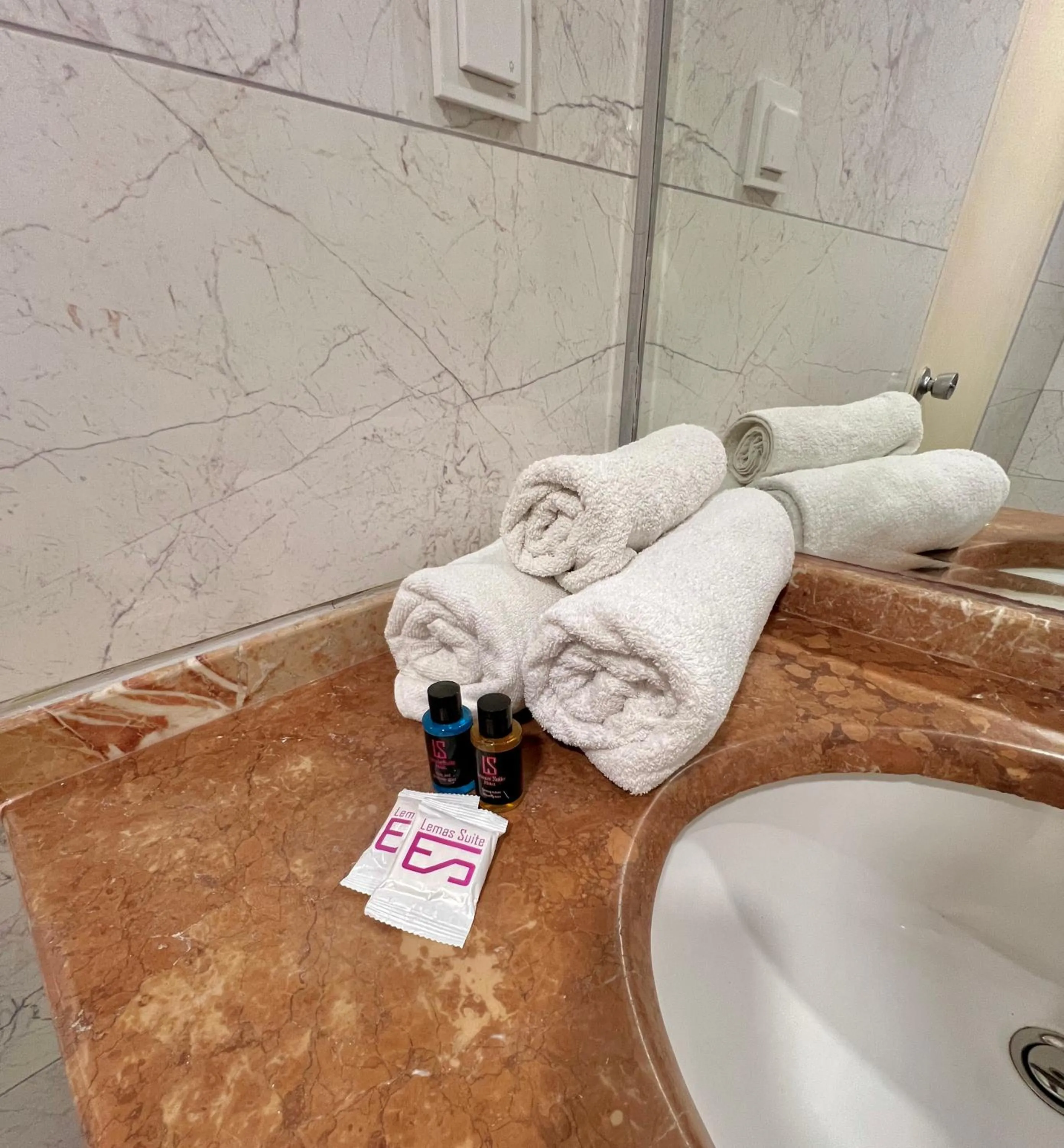 Bathroom in LEMAS SUITE HOTEL