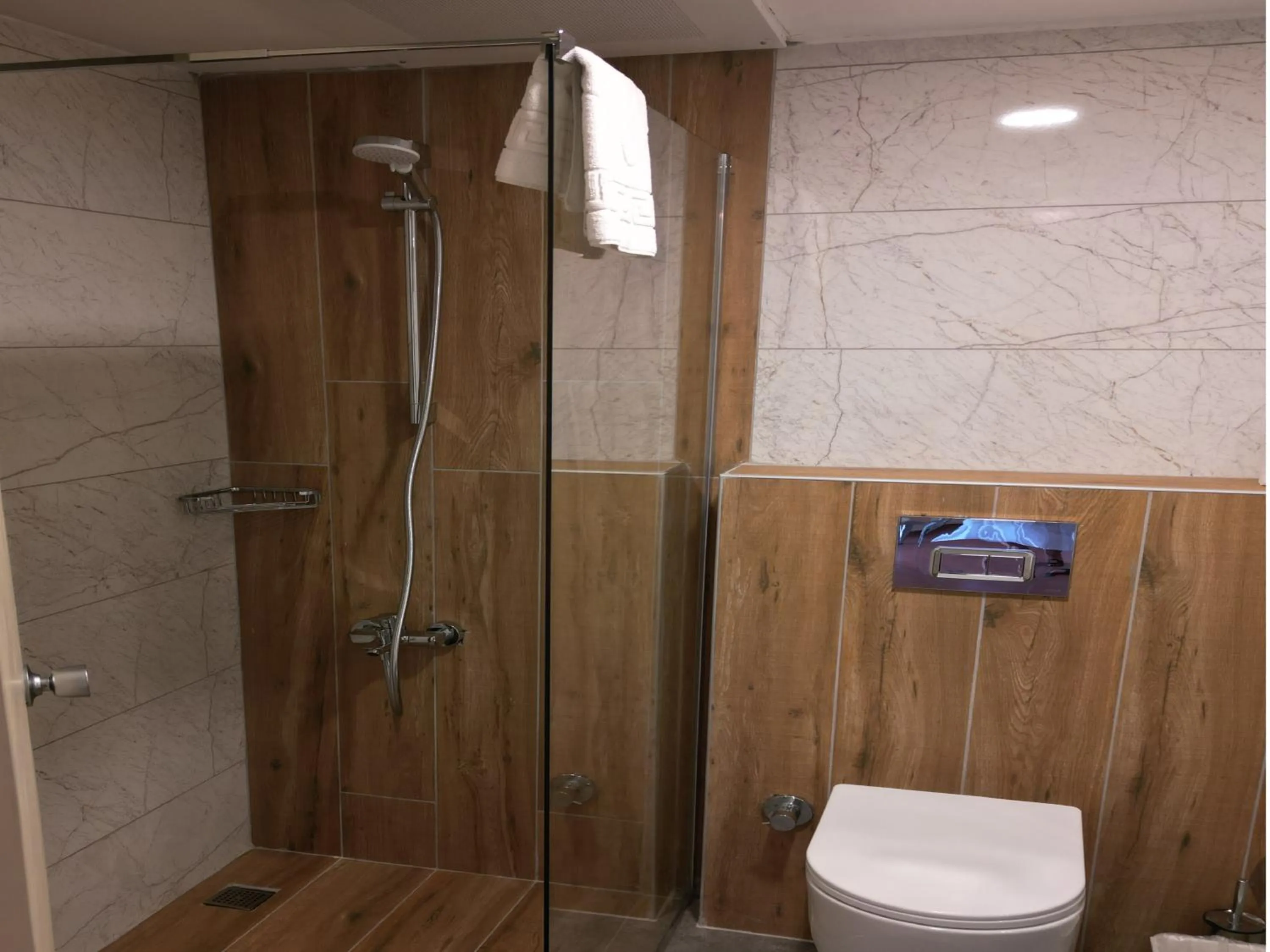 Bathroom in LEMAS SUITE HOTEL