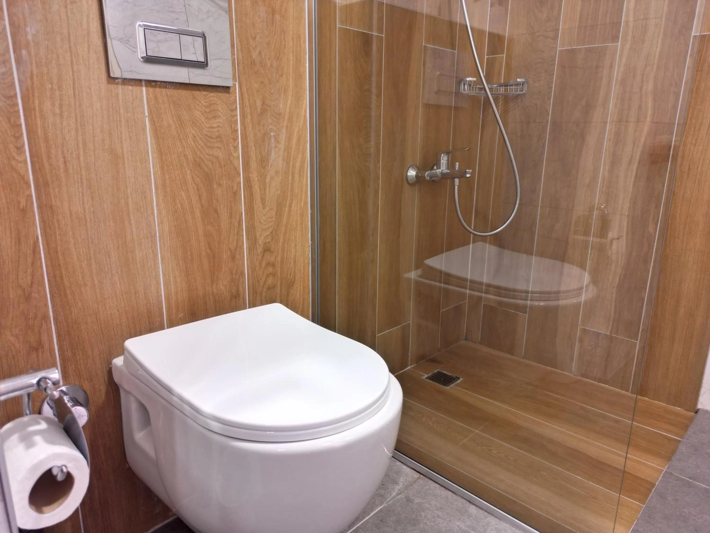 Bathroom in LEMAS SUITE HOTEL