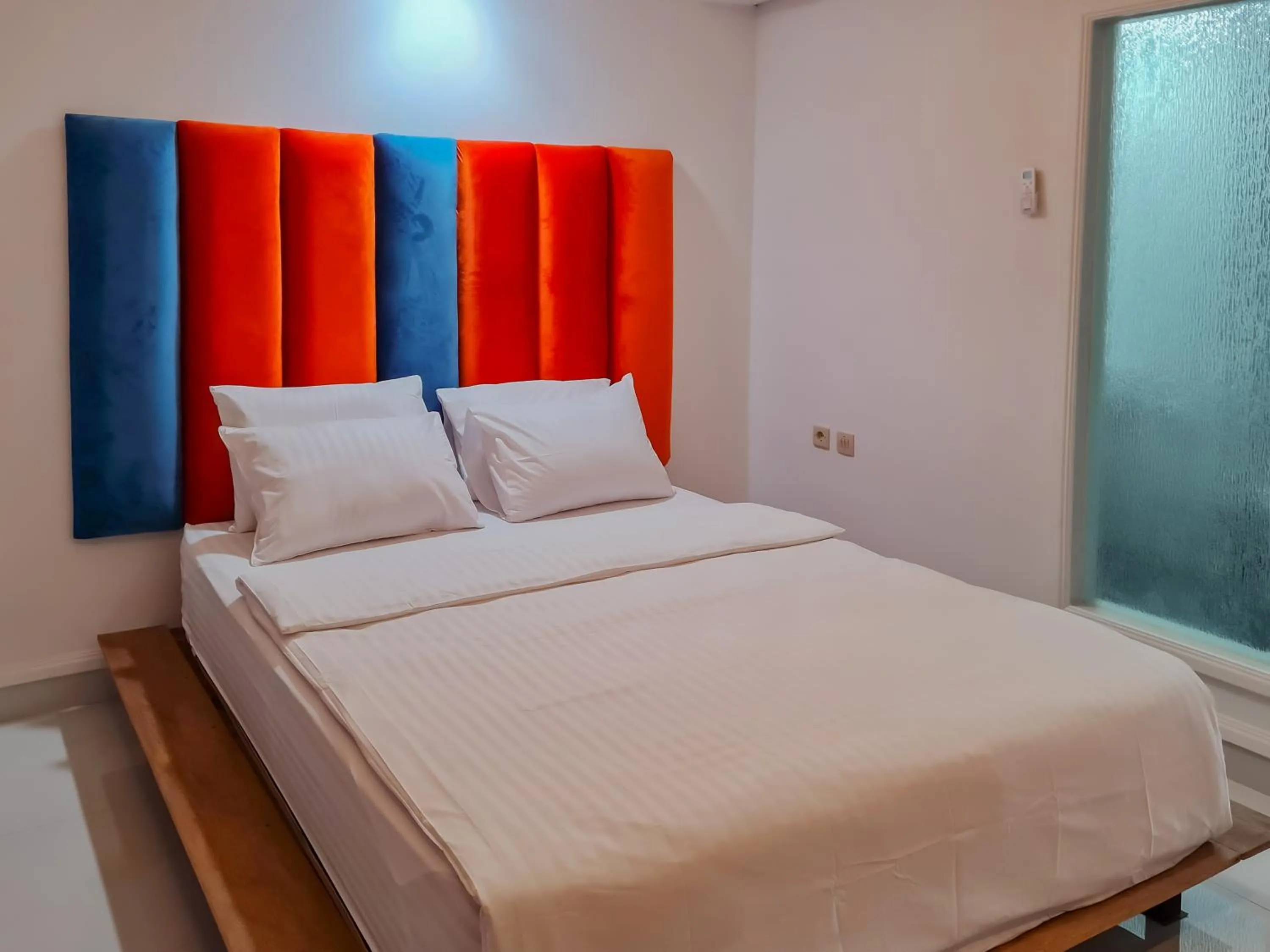 Bedroom, Bed in Sans Hotel Grand Sabaraya Cikampek