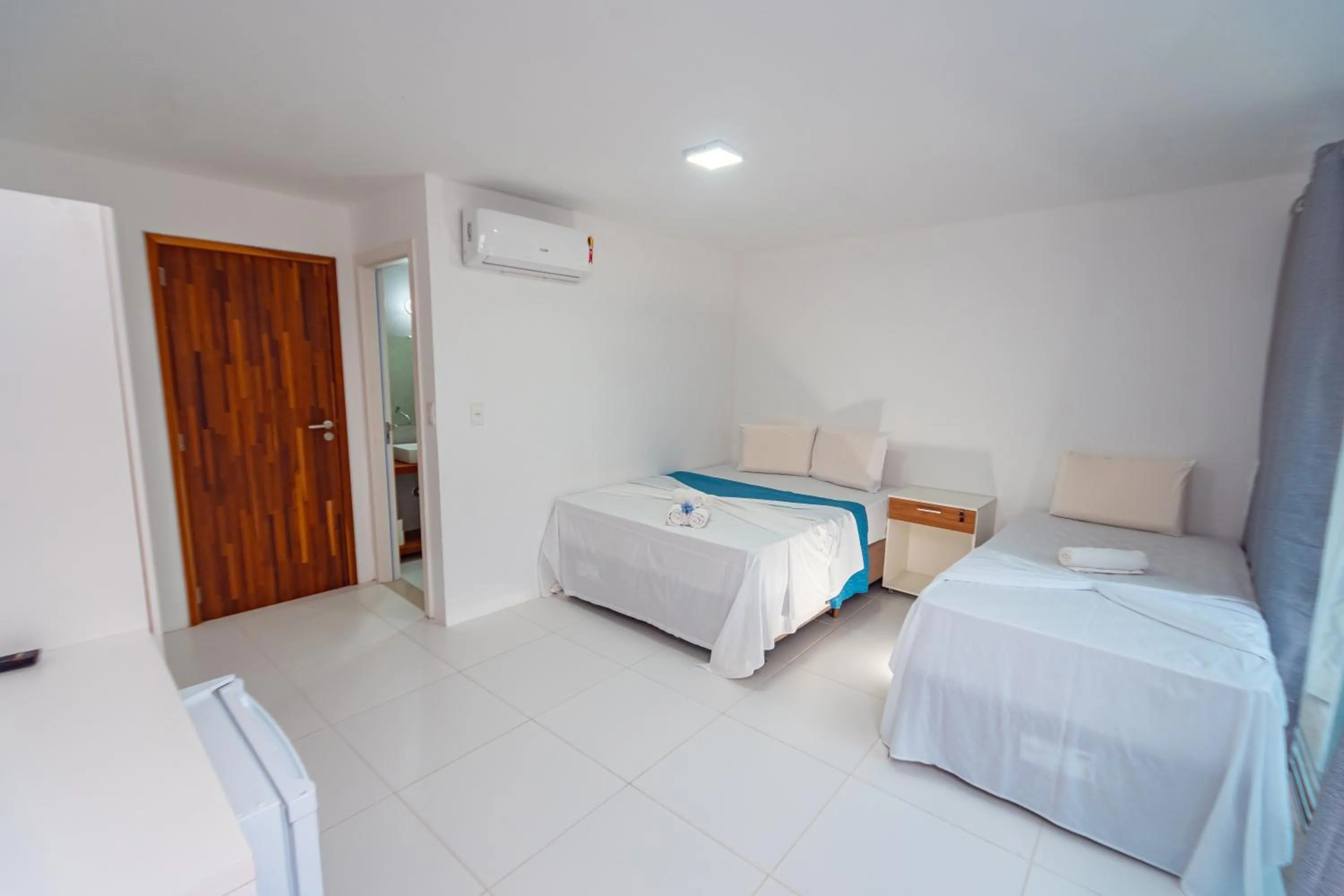 Photo of the whole room, Bed in Brisa do Mar Praia Hotel