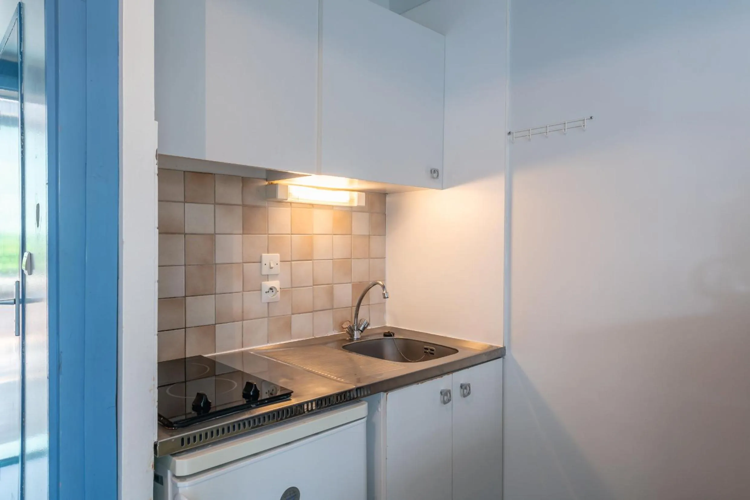 Kitchen or kitchenette in Résidence les Cavales