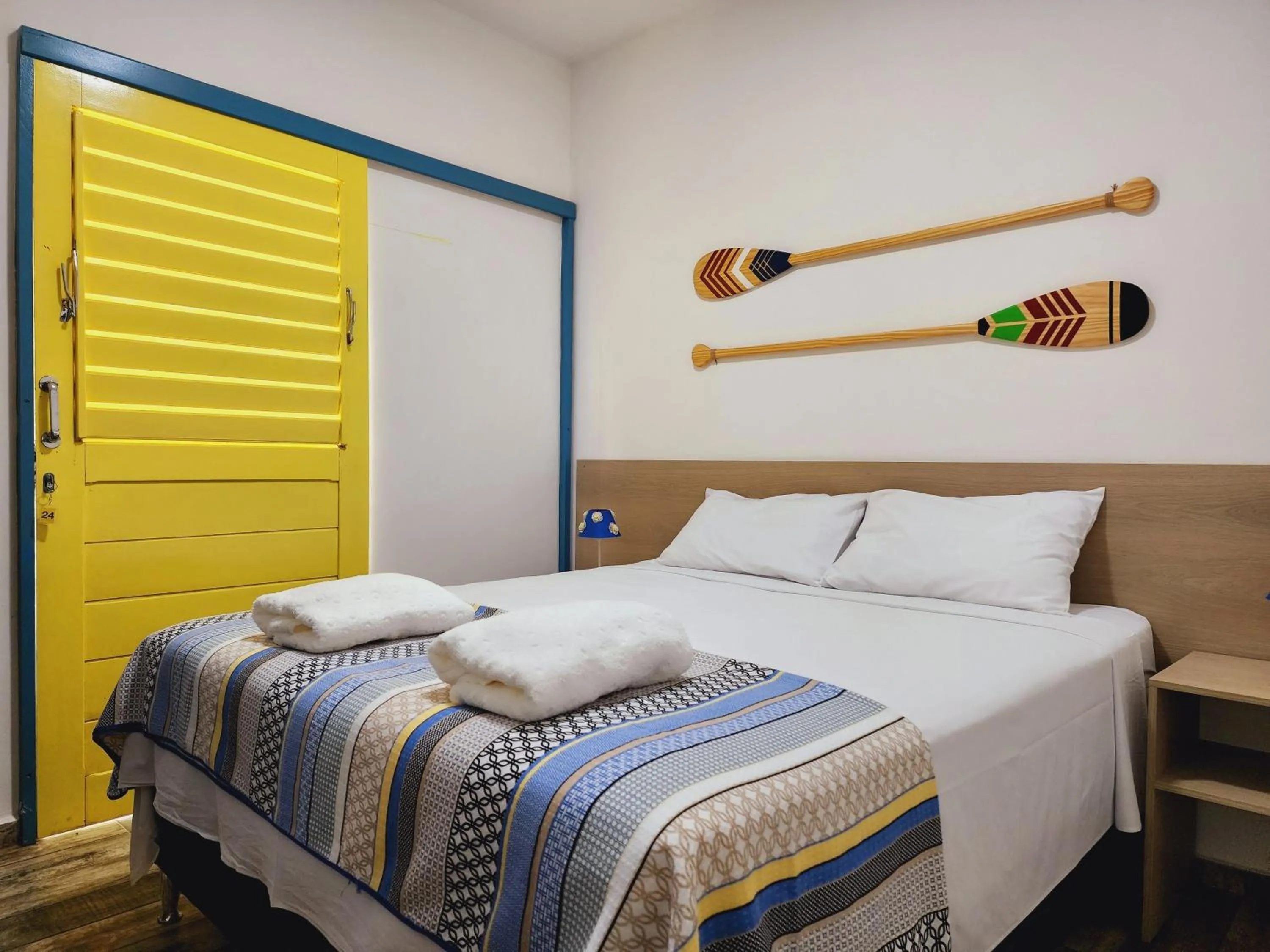 Bed in Manaí Pousada & Beach Club