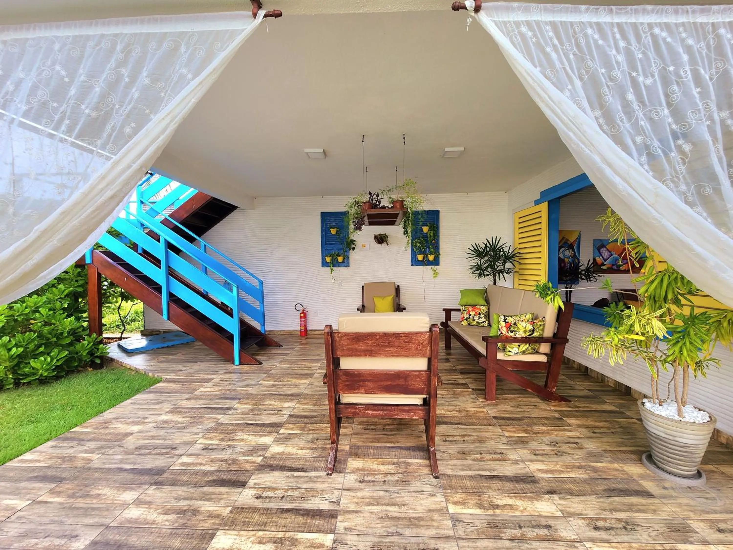 Seating area in Manaí Pousada & Beach Club