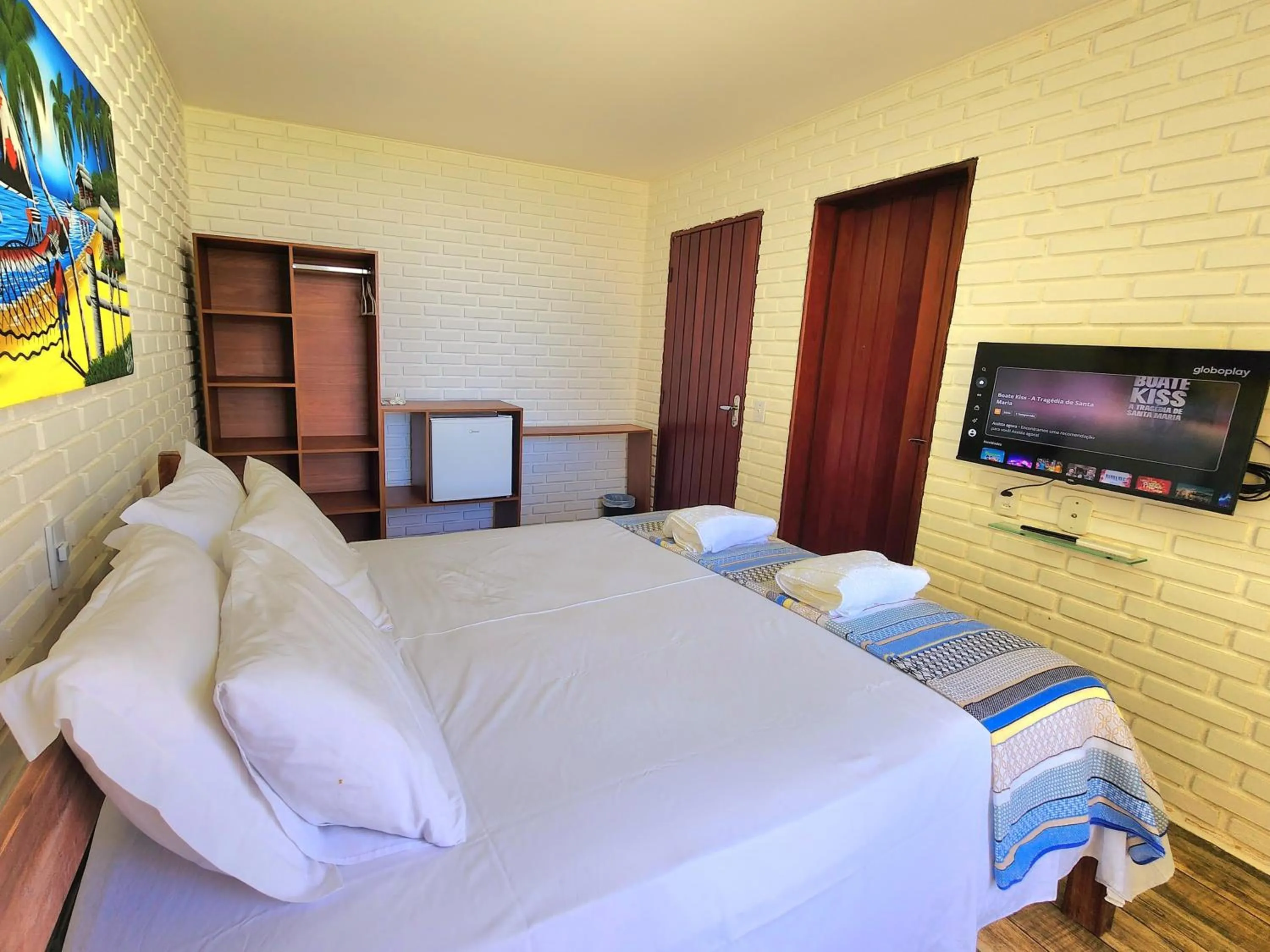 Bed in Manaí Pousada & Beach Club