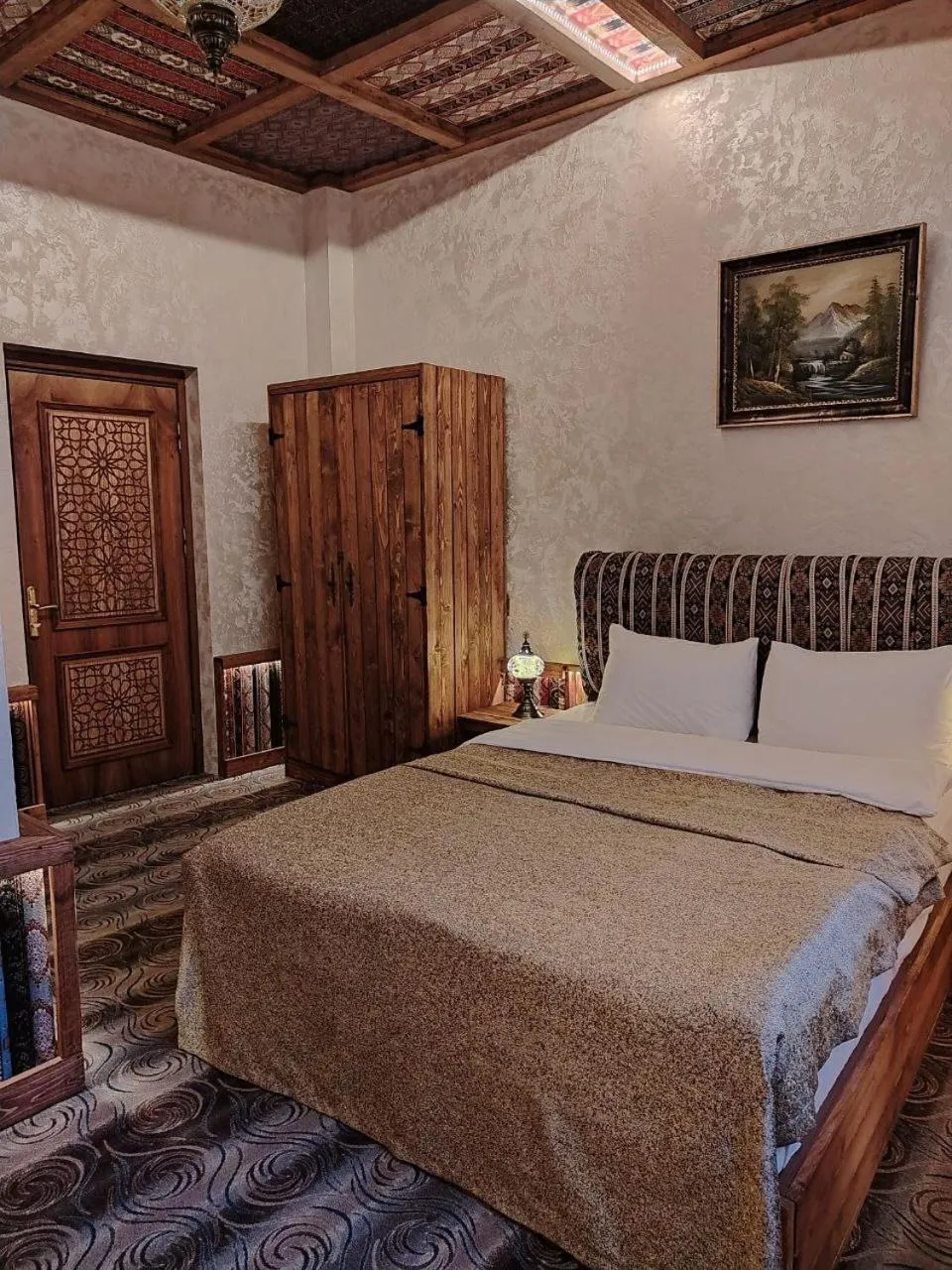 Bed in Qiz Galasi Hotel Baku