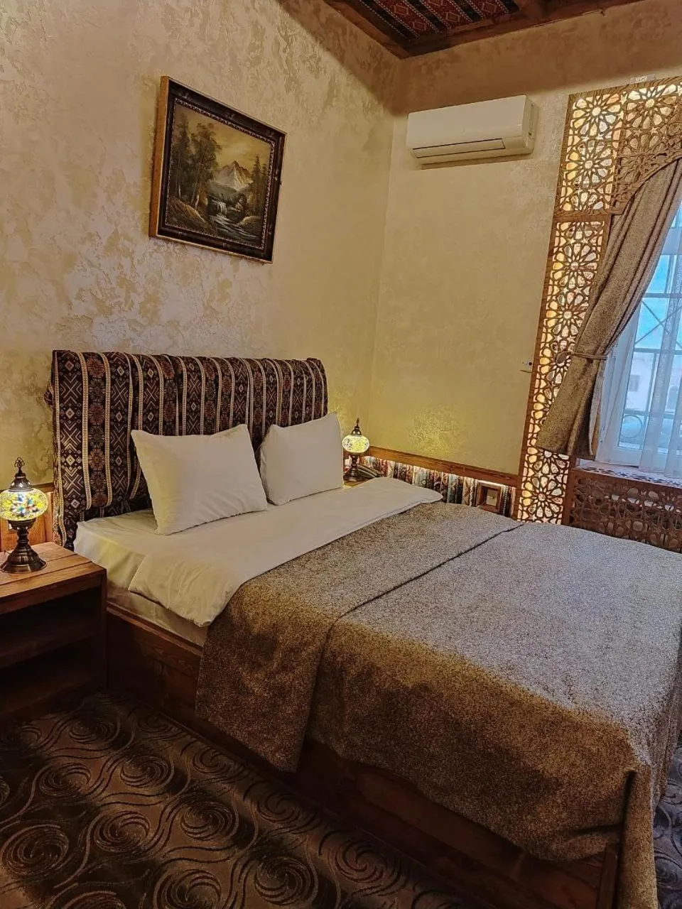 Bed in Qiz Galasi Hotel Baku