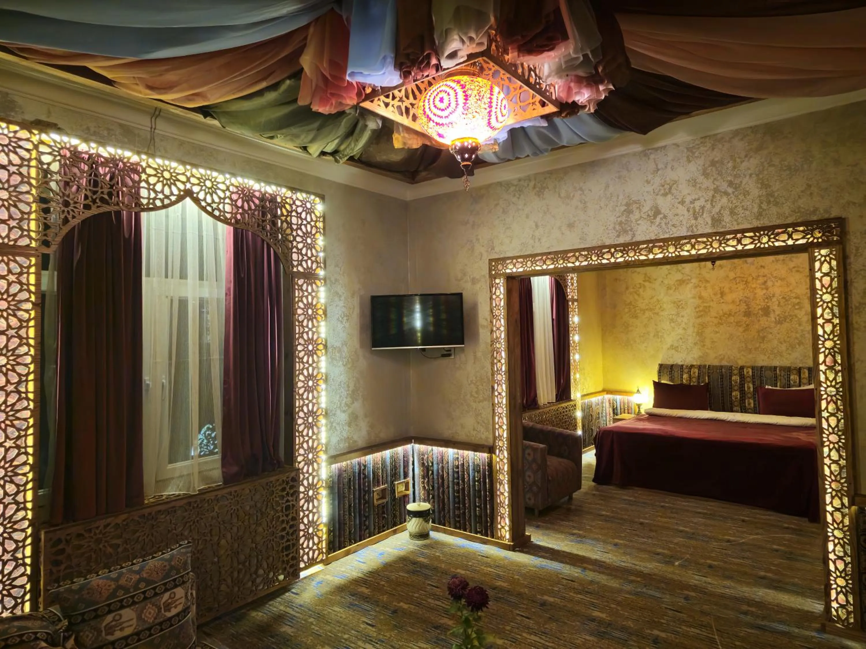 Communal lounge/ TV room, Bed in Qiz Galasi Hotel Baku