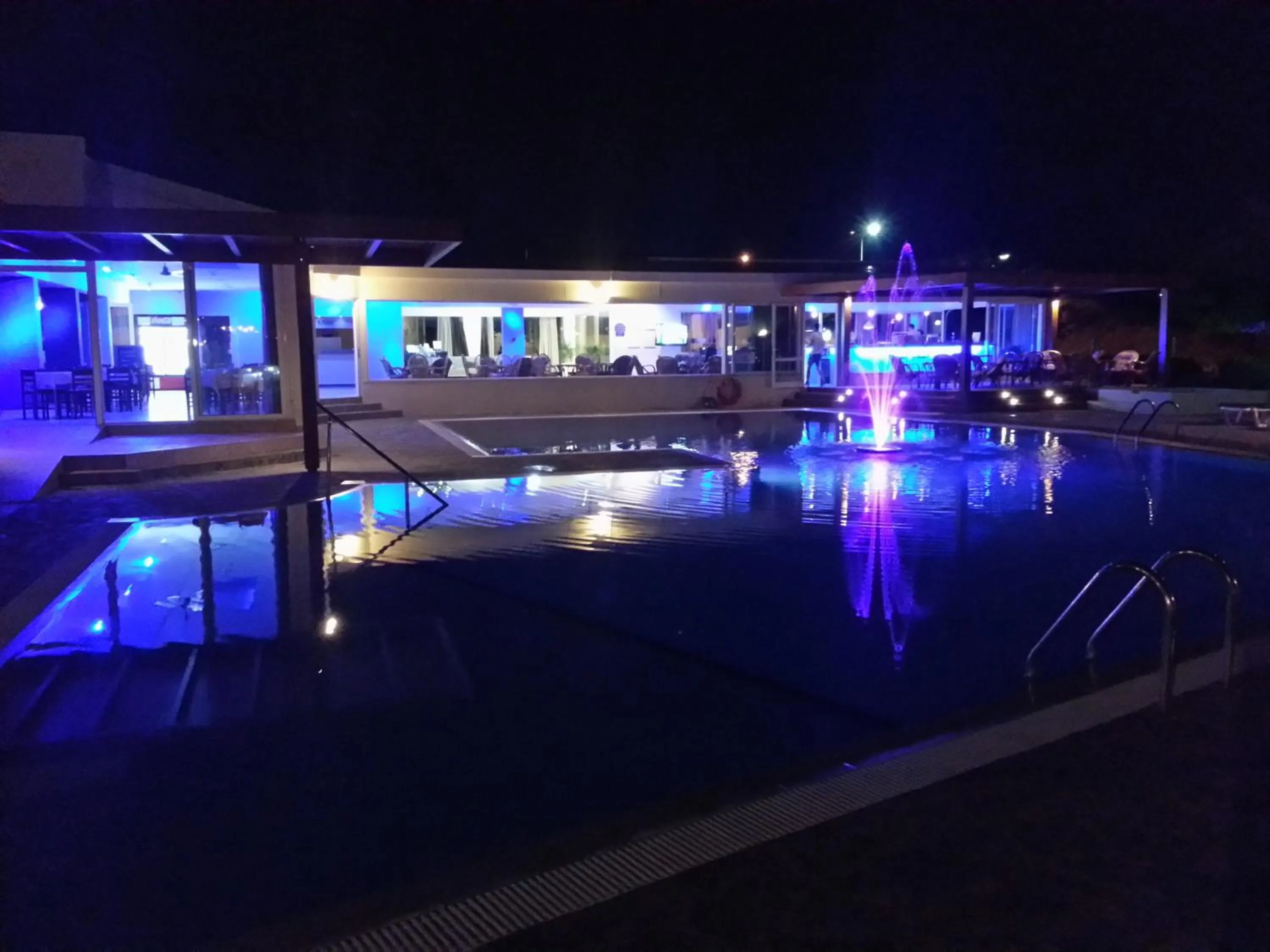 Swimming pool in Zoes Hotel & Suites