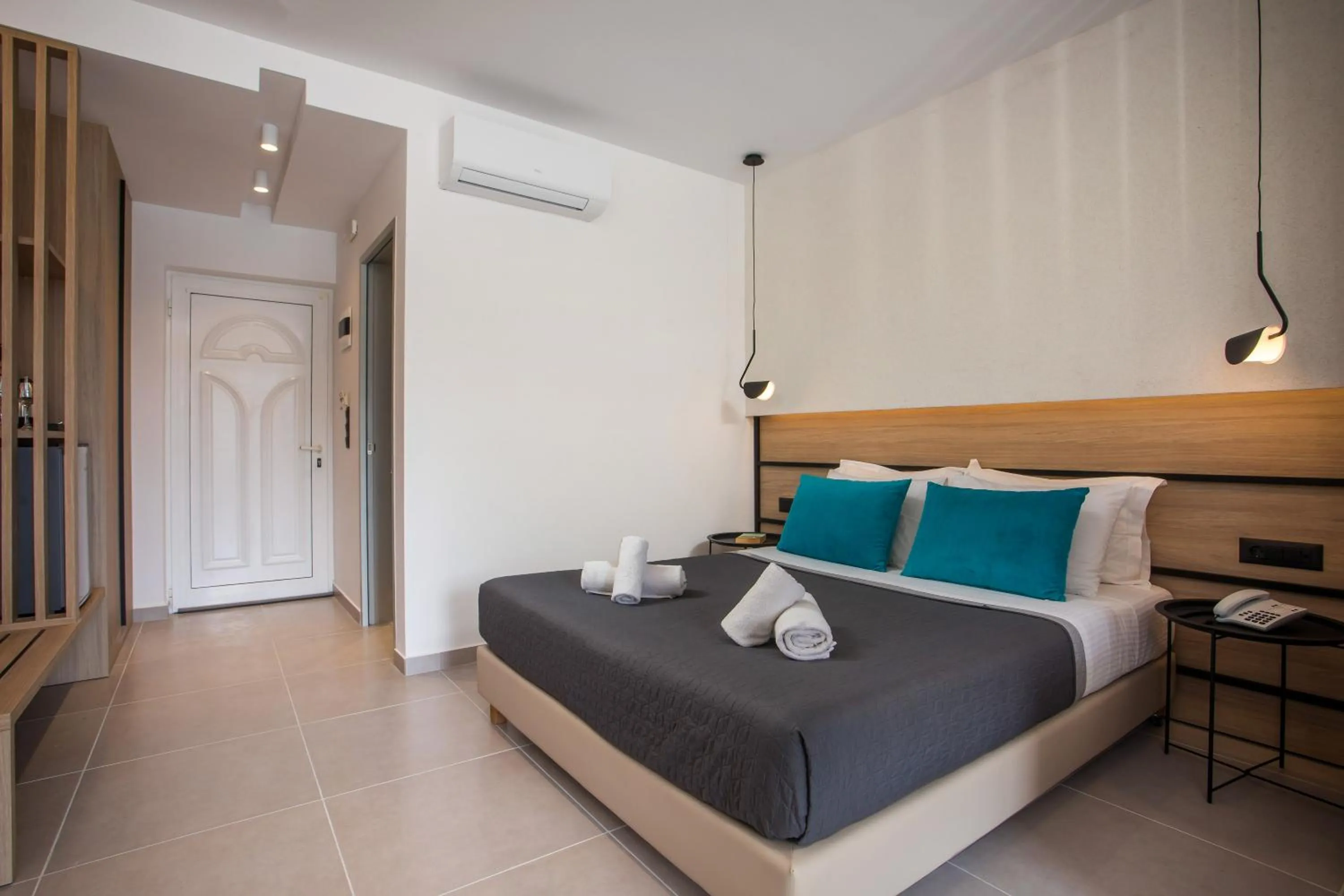 Bed in Zoes Hotel & Suites