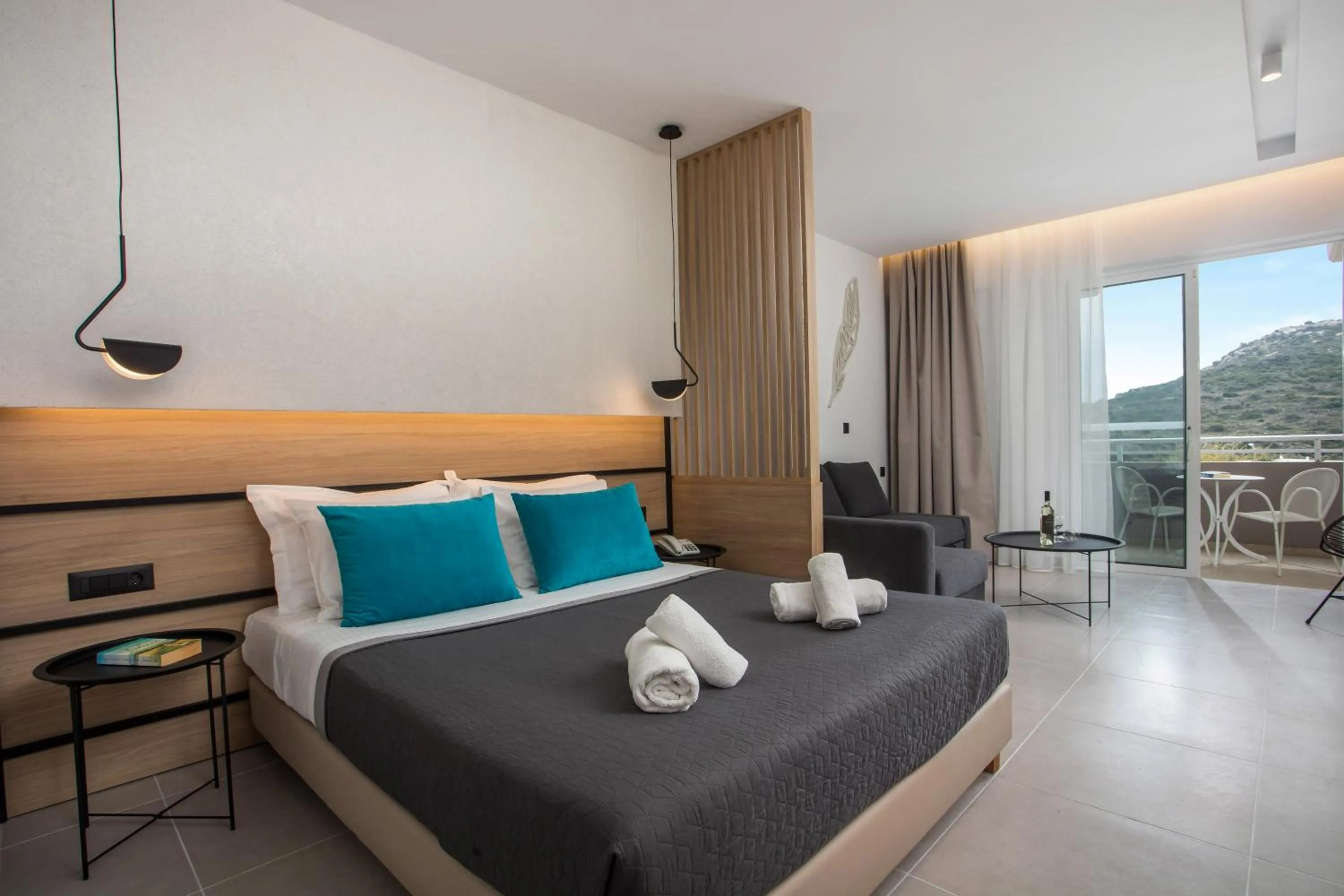 Bed in Zoes Hotel & Suites