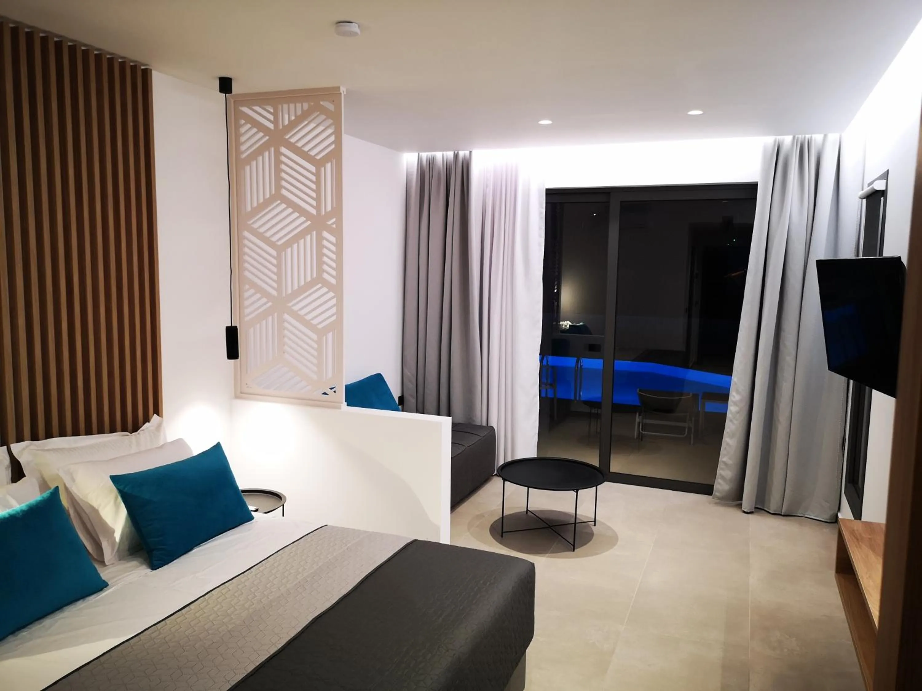 Bed in Zoes Hotel & Suites