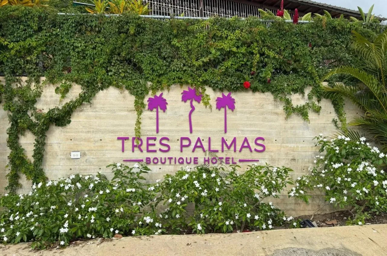 Property logo or sign in Tres Palmas Boutique Hotel