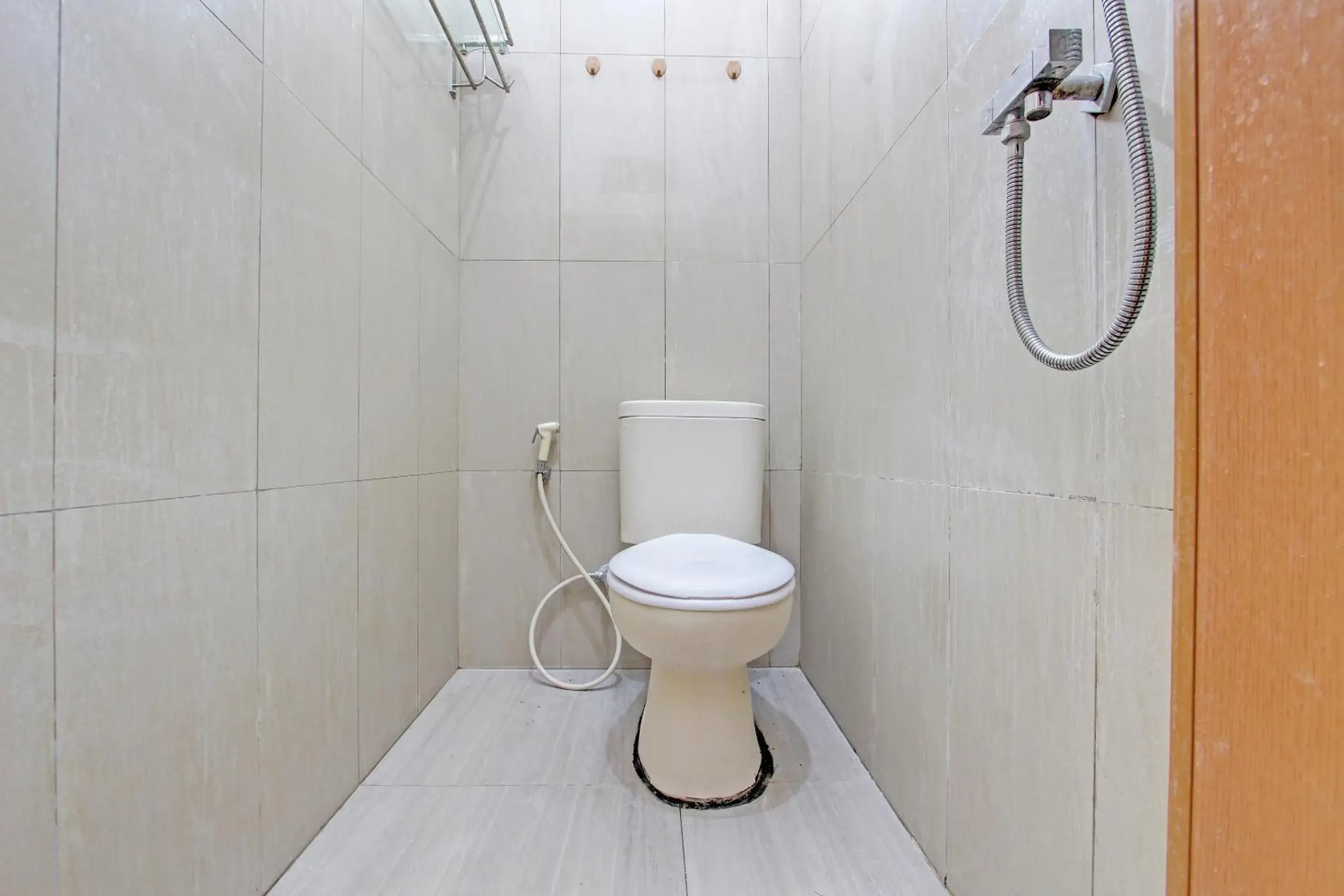 Bathroom in Hotel O Nayo Homestay Syariah Bathroom in Hotel O Nayo Homestay Syariah