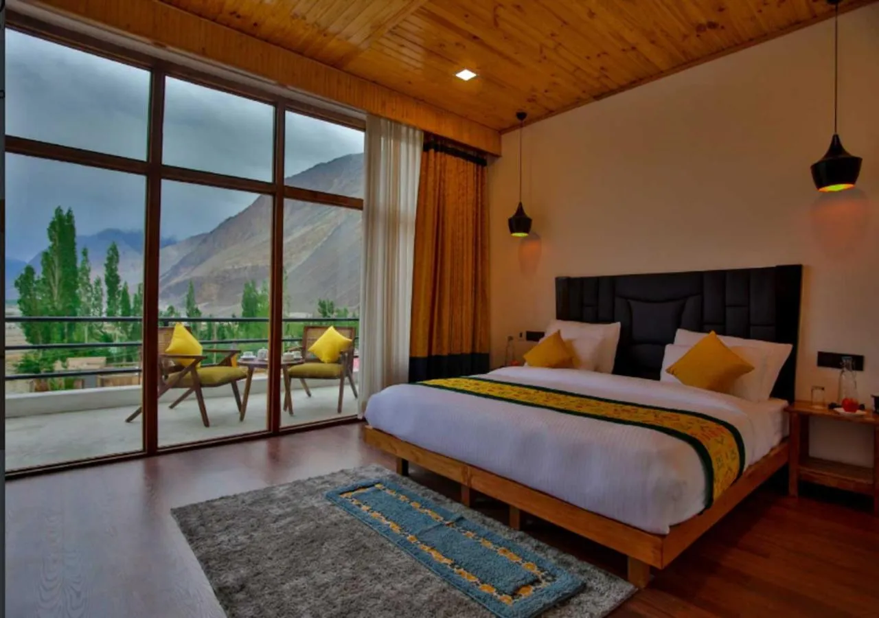 Photo of the whole room, Bed in The Dunes Boutique Hotel