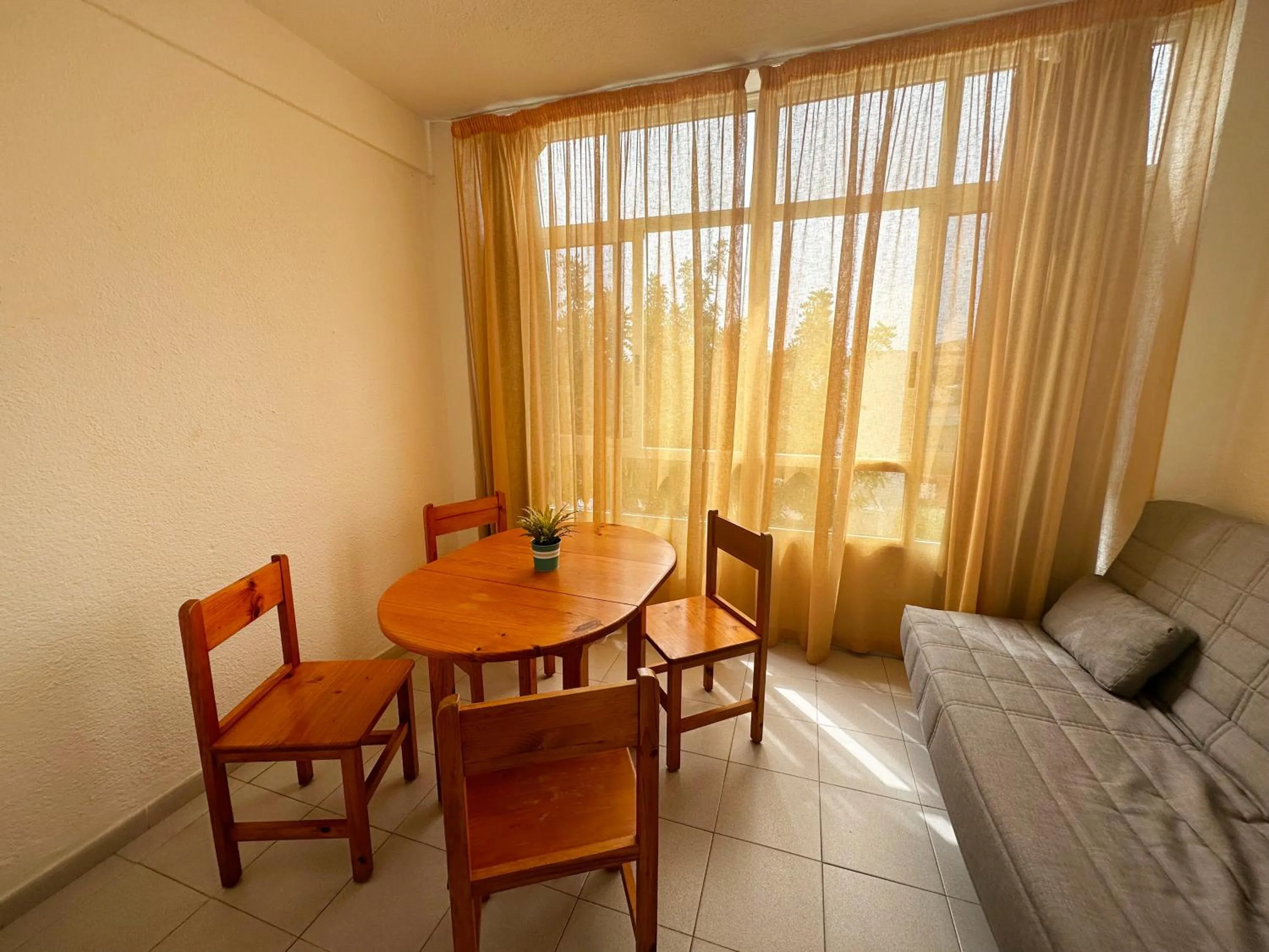 Living room, Bed in Apartamentos Sol y Luna 3000