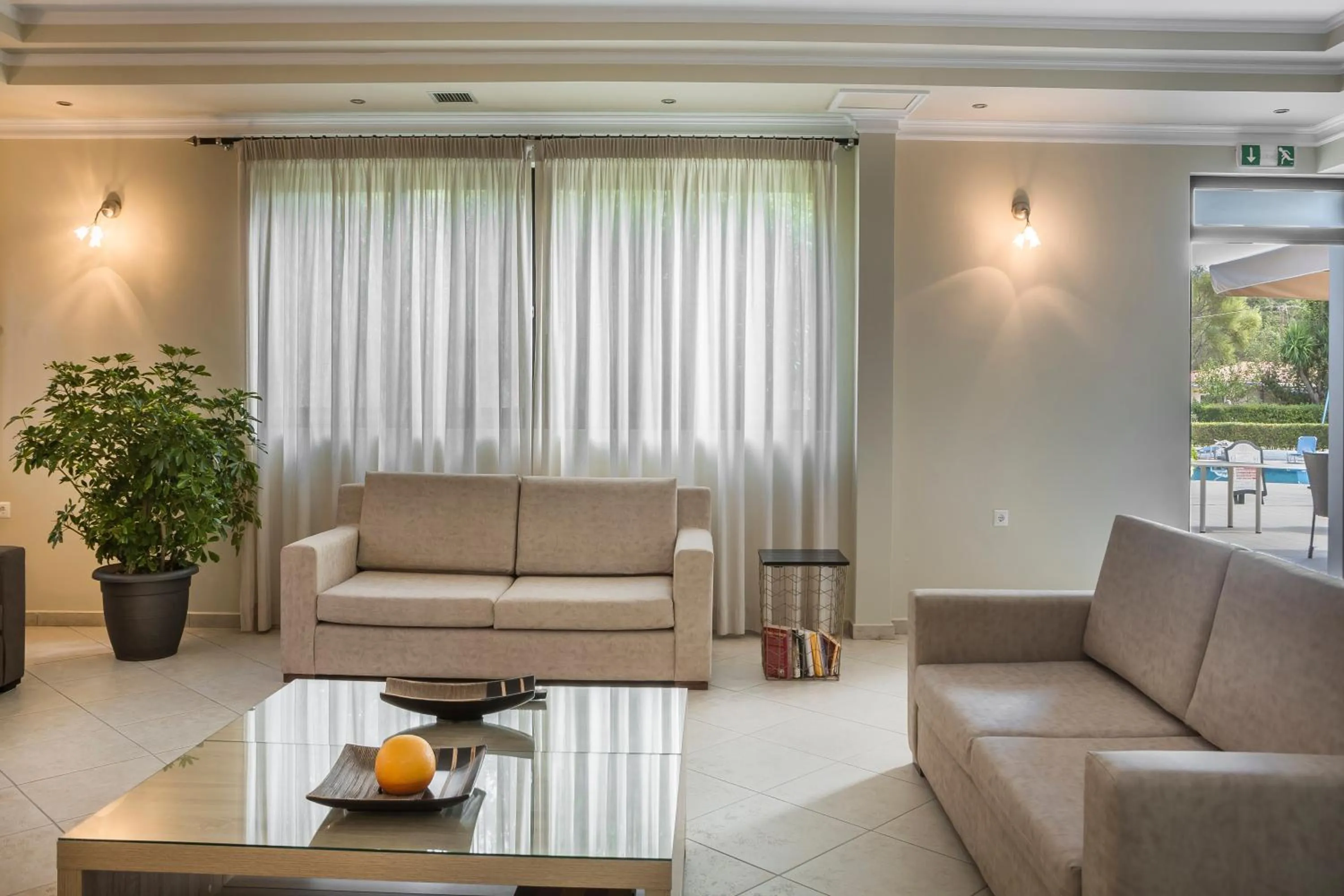 Communal lounge/ TV room in Limanaki Hotel