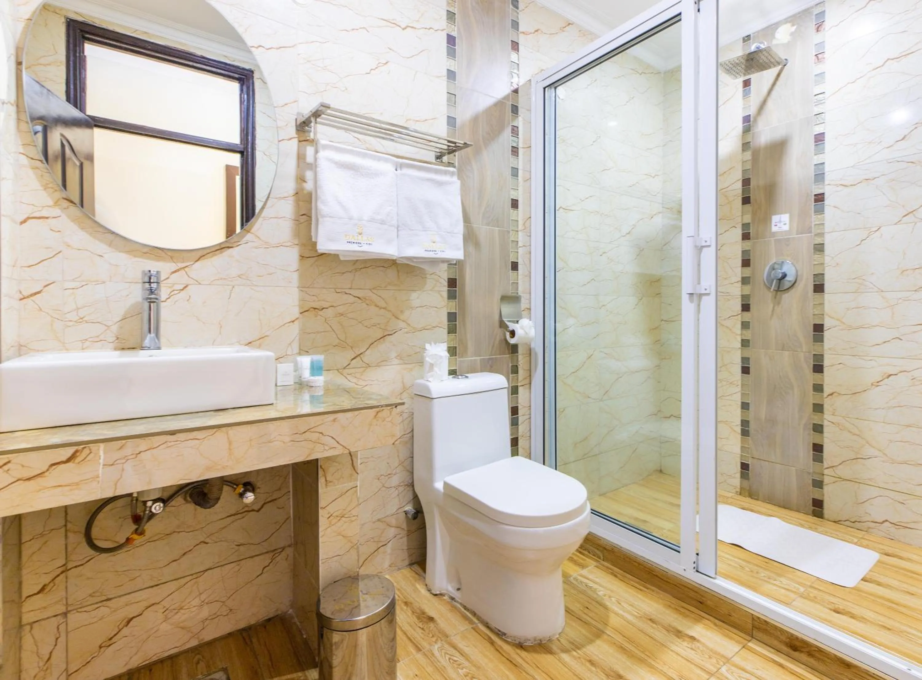 Bathroom in Dallas Premiere Hotel