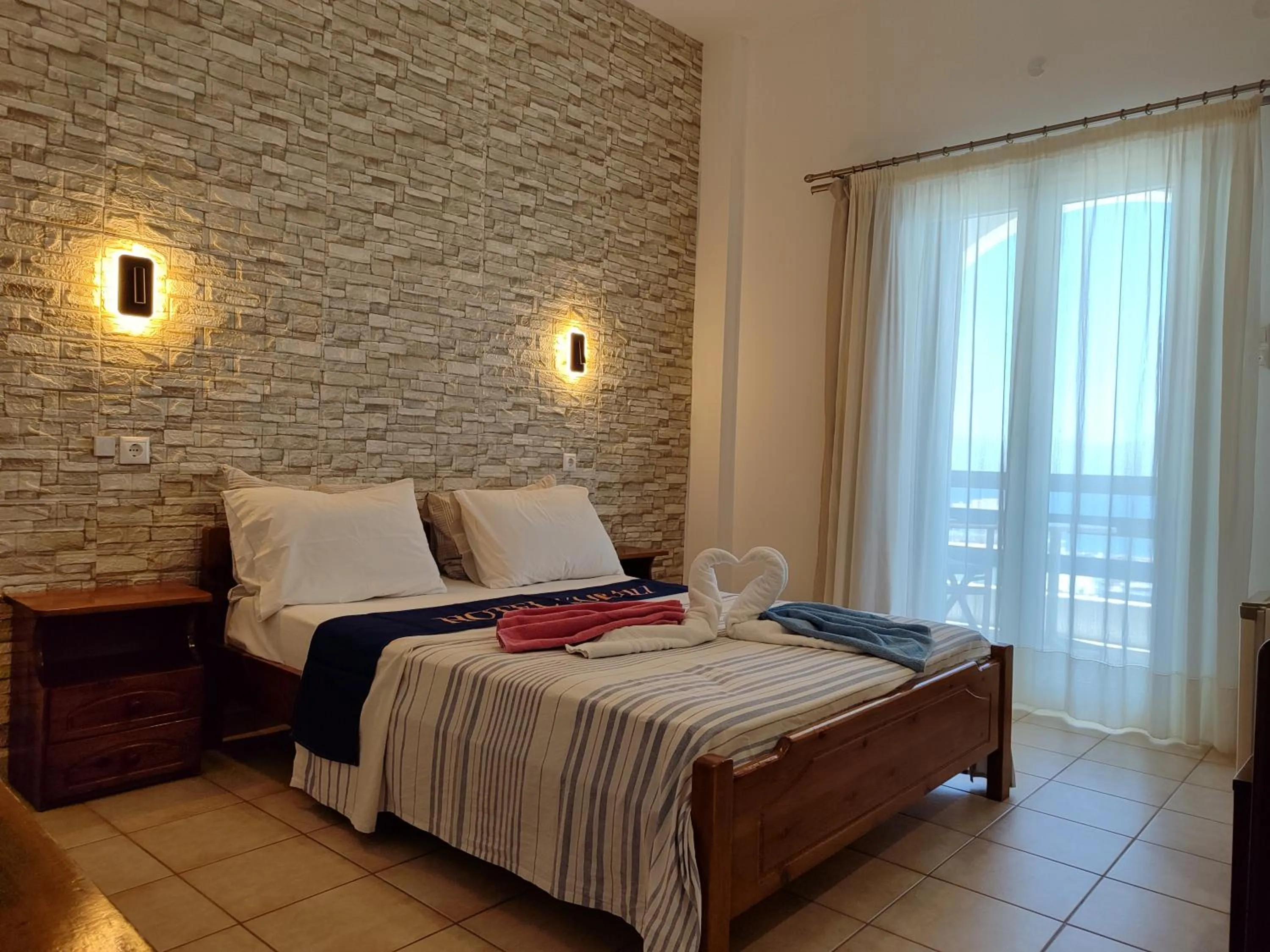 Bed in Corali Hotel