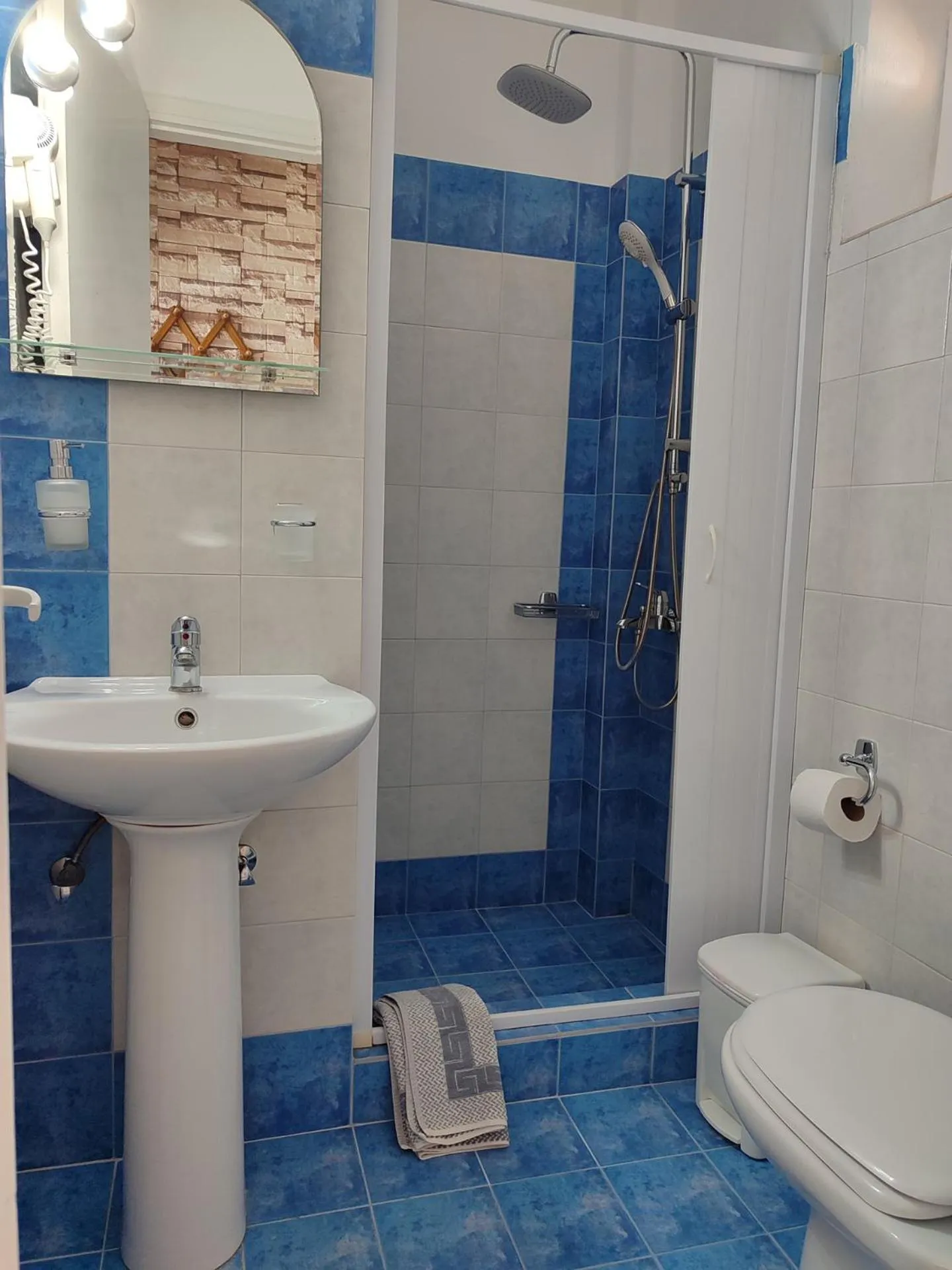 Bathroom in Corali Hotel