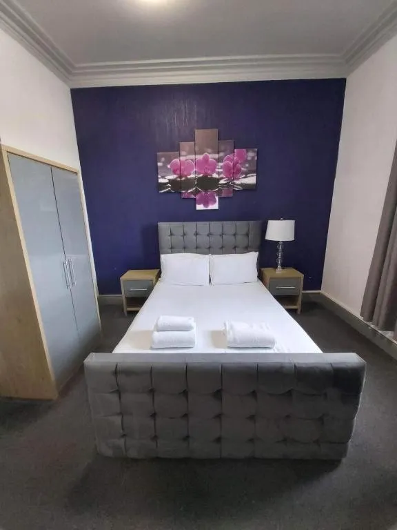 Bedroom, Bed in OYO Ivy Hotel