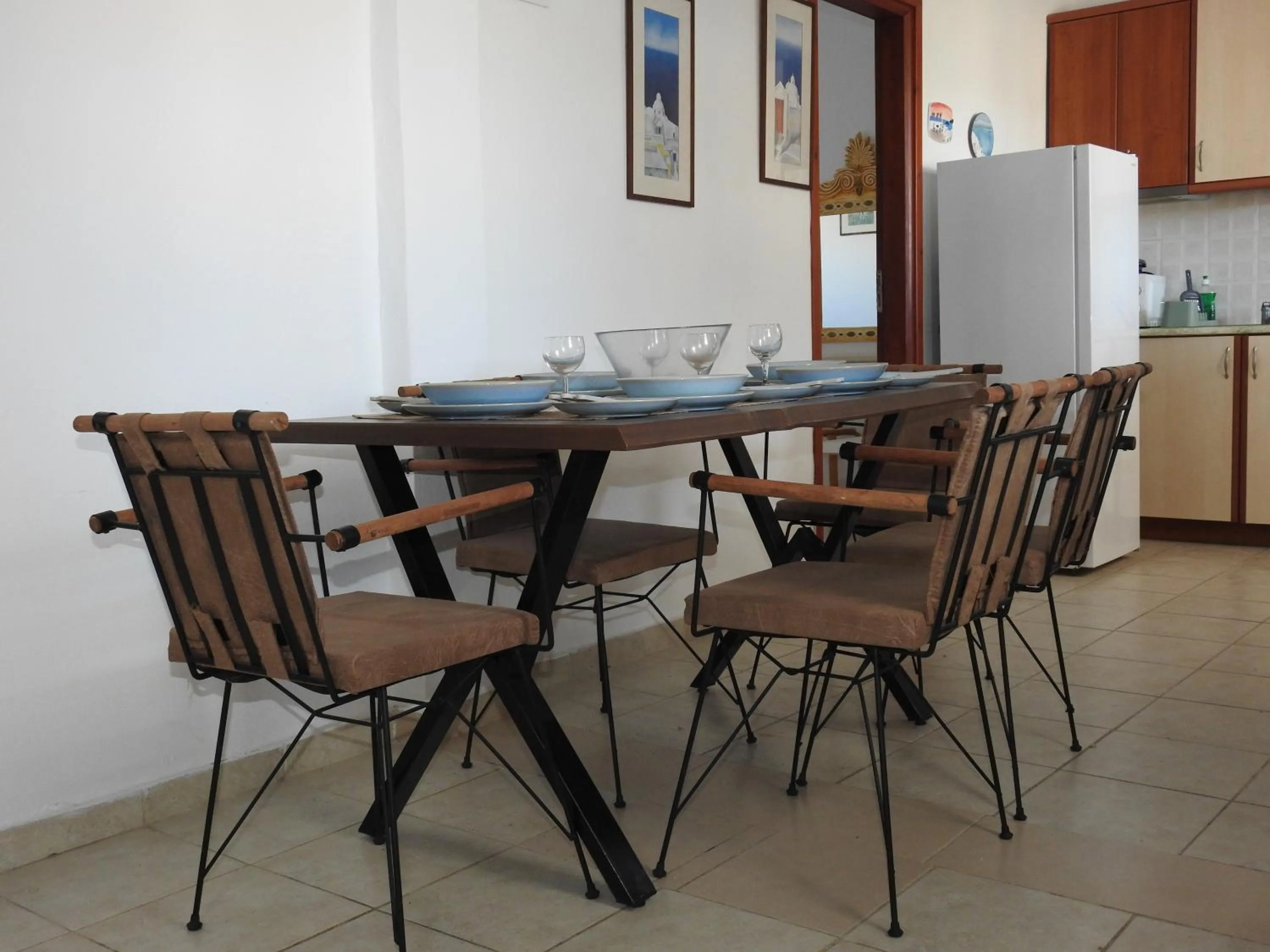 Dining area in Birds Villa Apartments with Heated Pool - Including Car and Breakfast