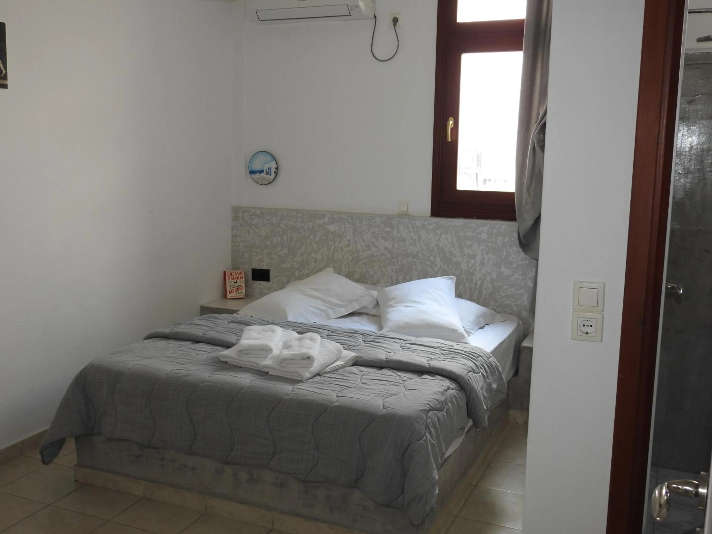 Bedroom, Bed in Birds Villa Apartments with Heated Pool - Including Car and Breakfast