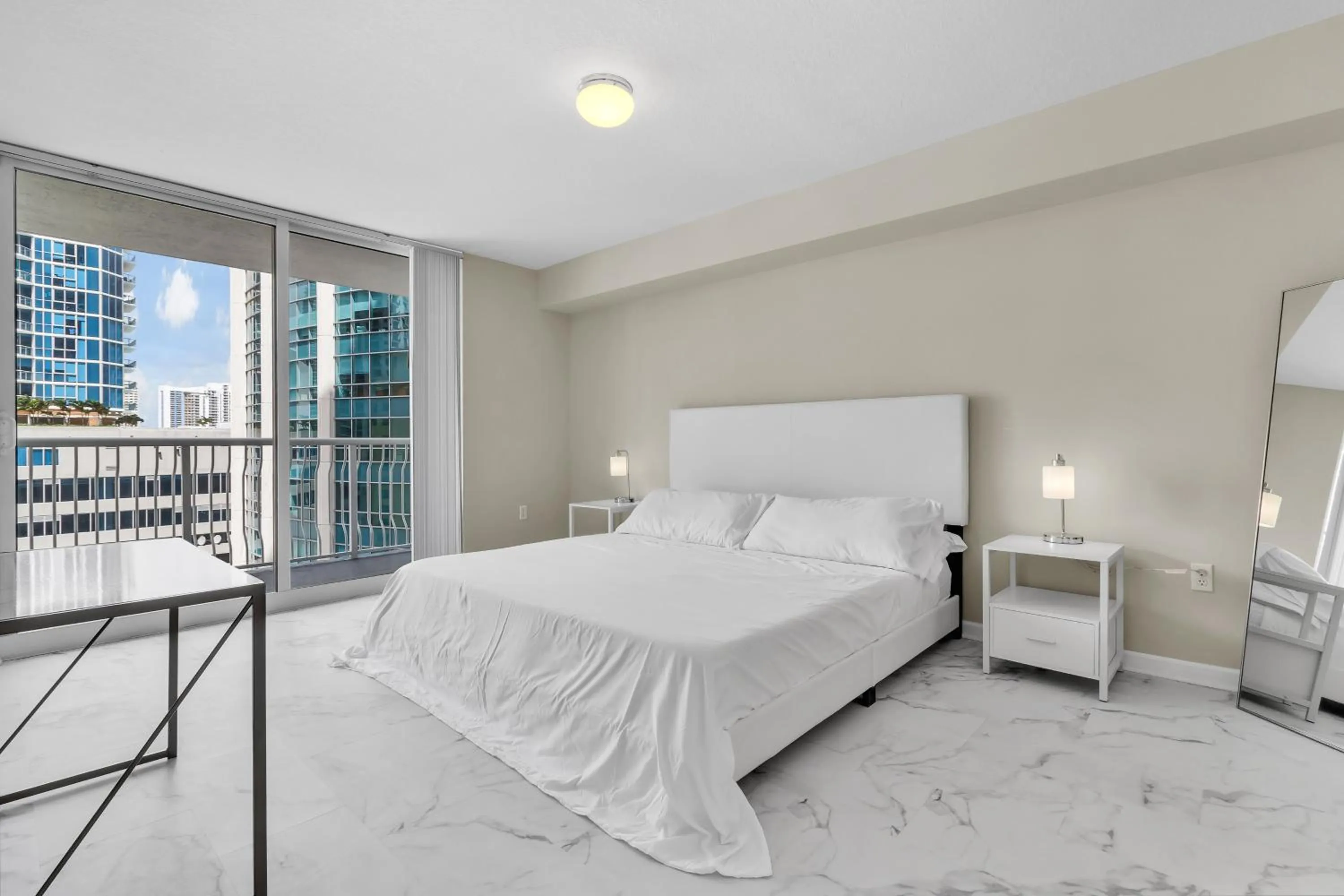 Bed in The Club at Brickell Bay Luxury Suites