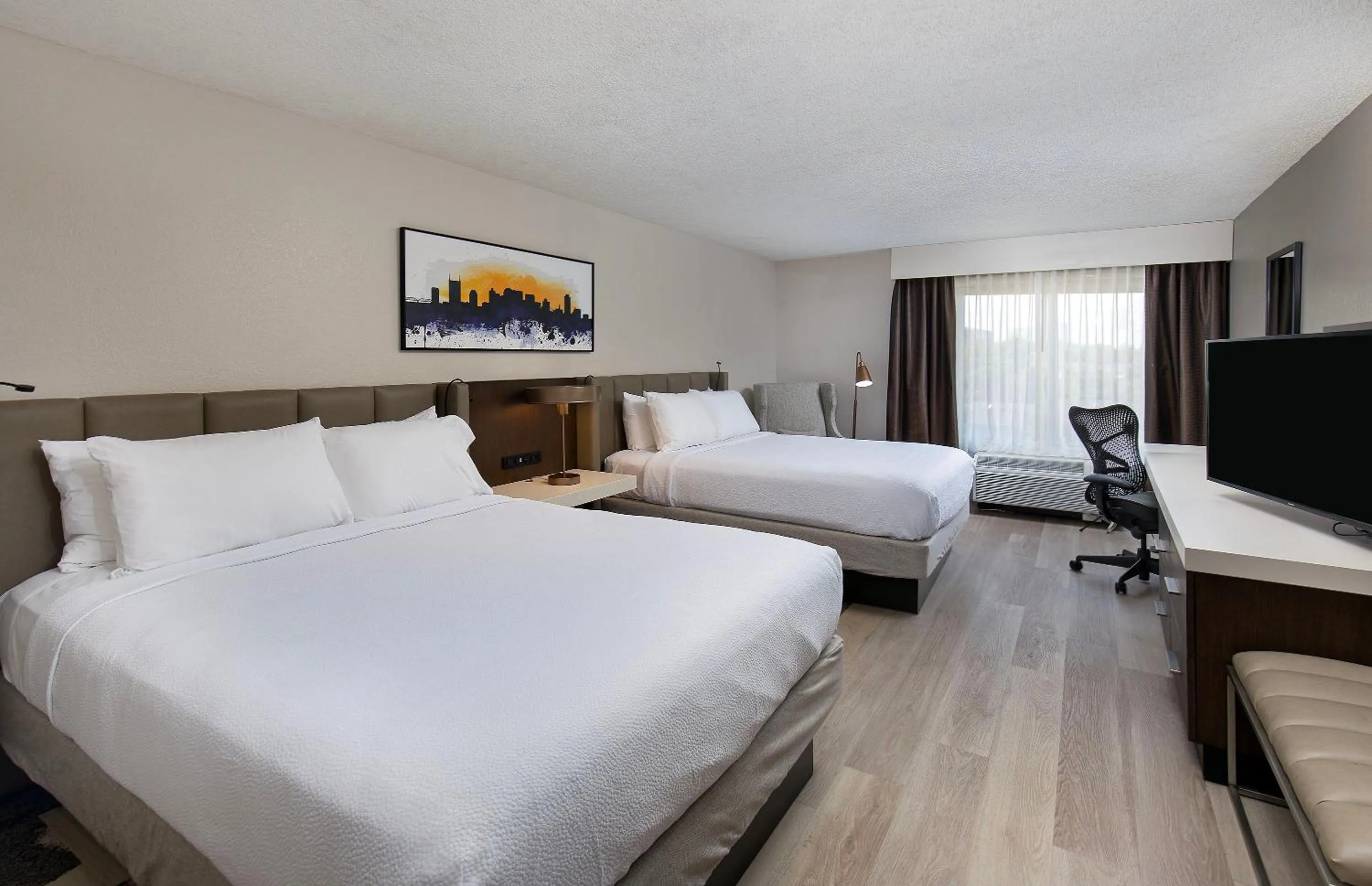 Bed in Nash Haus Hotel