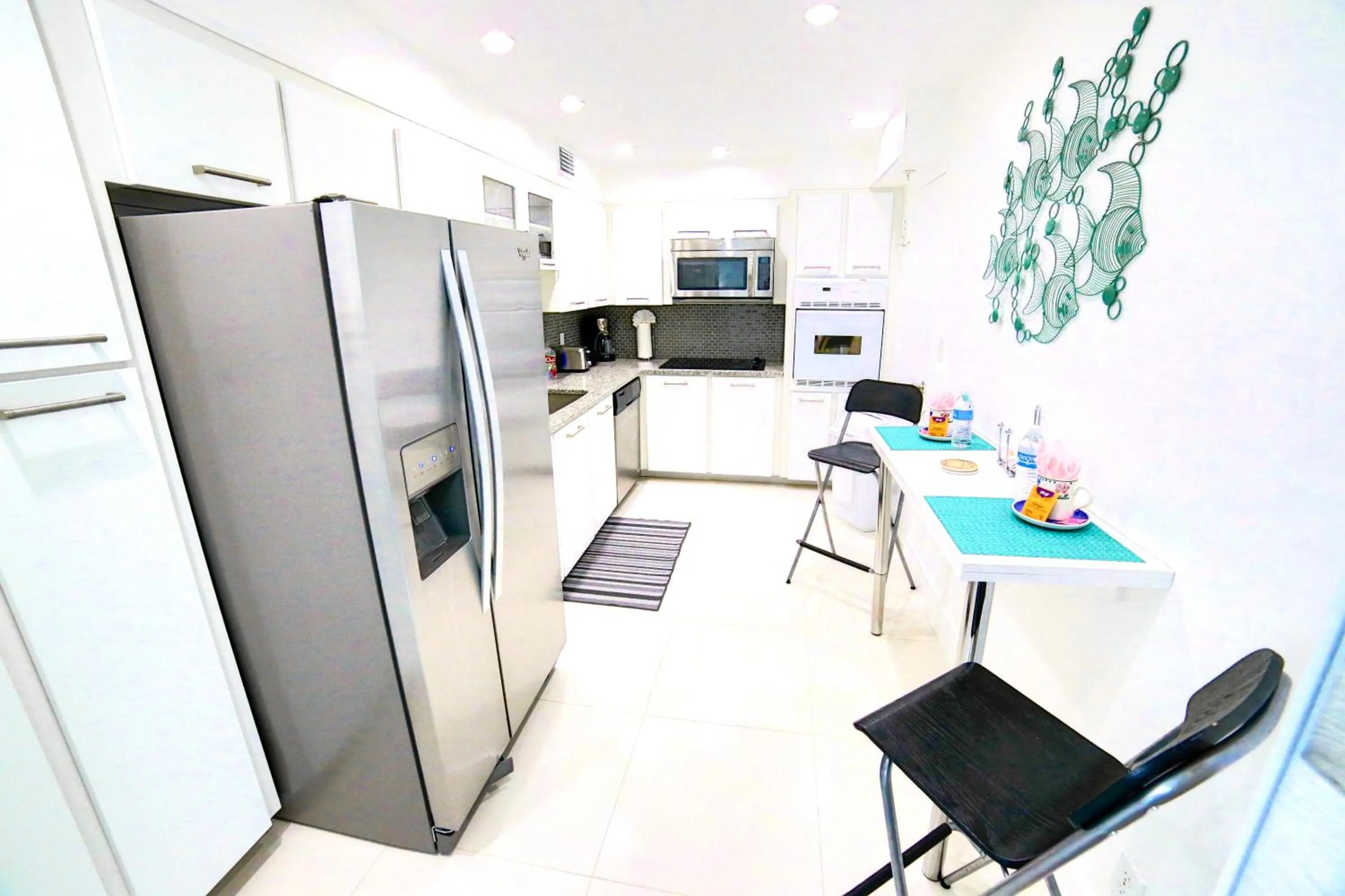 Kitchen or kitchenette in Beautiful penthouse condo with stunning views of both ocean and city