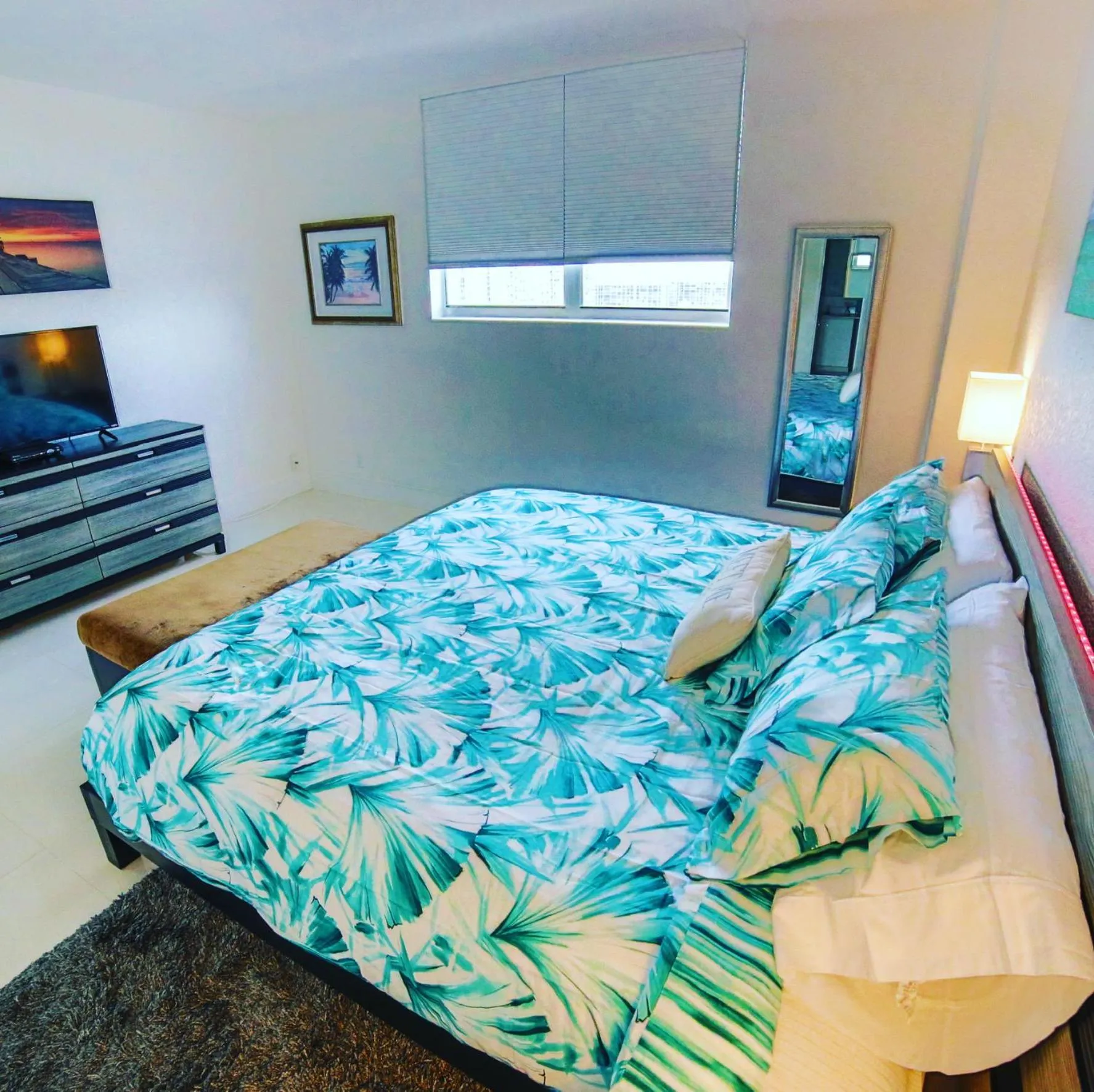 Bed in Beautiful penthouse condo with stunning views of both ocean and city
